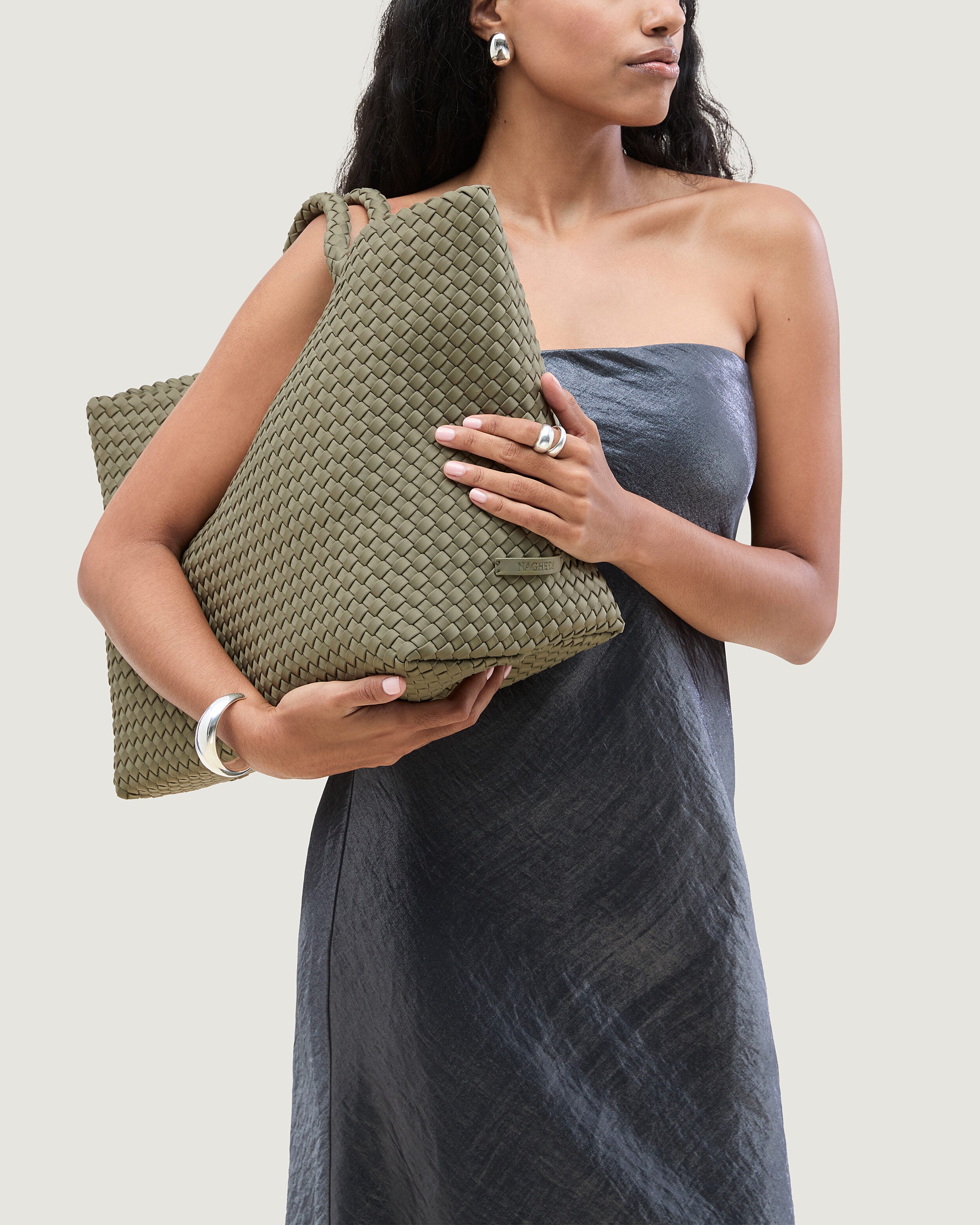 St. Barths Tote in Olea shown on model to illustrate scale and soft silhouette.