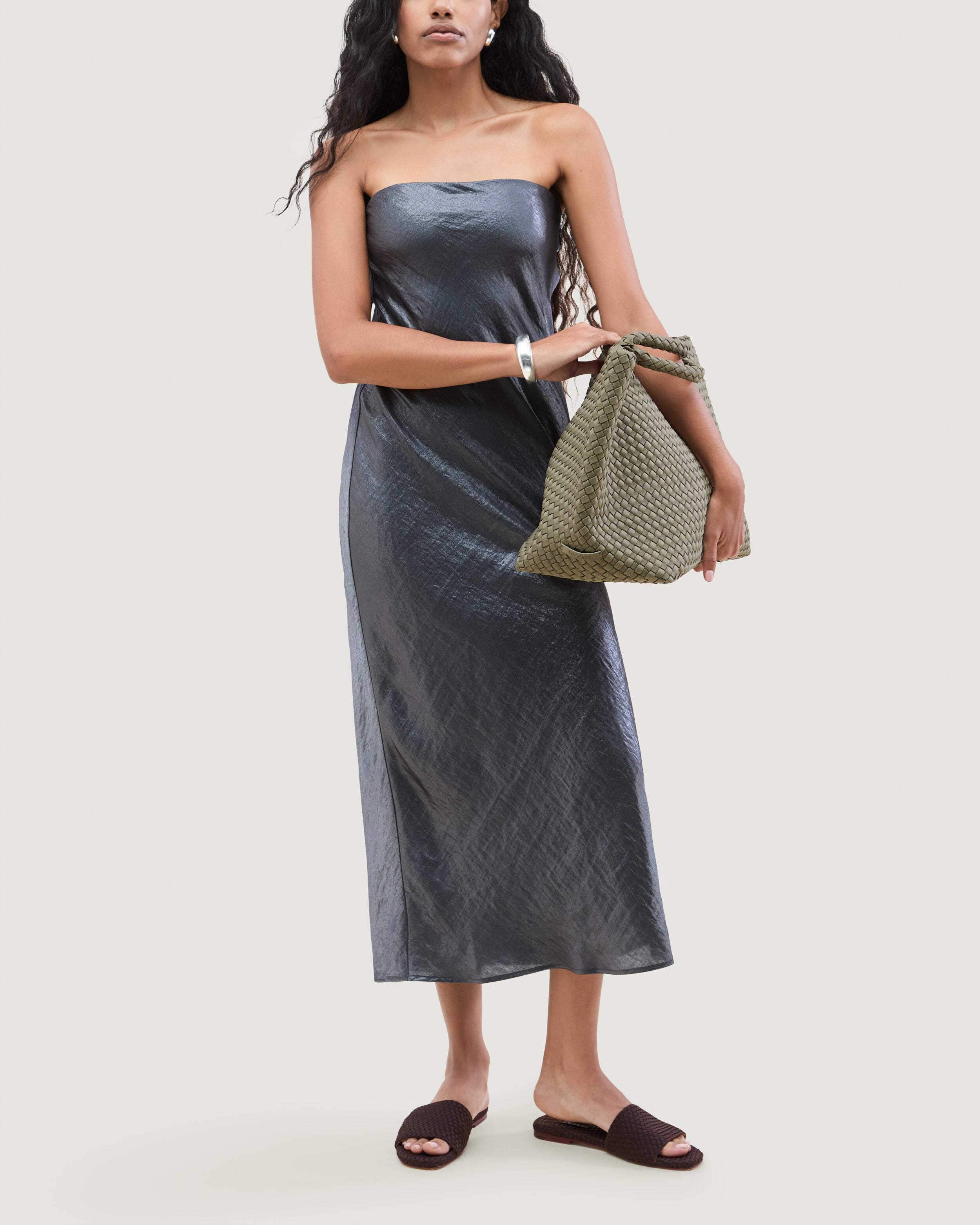 St. Barths Tote in Olea shown on model to illustrate scale and soft silhouette.