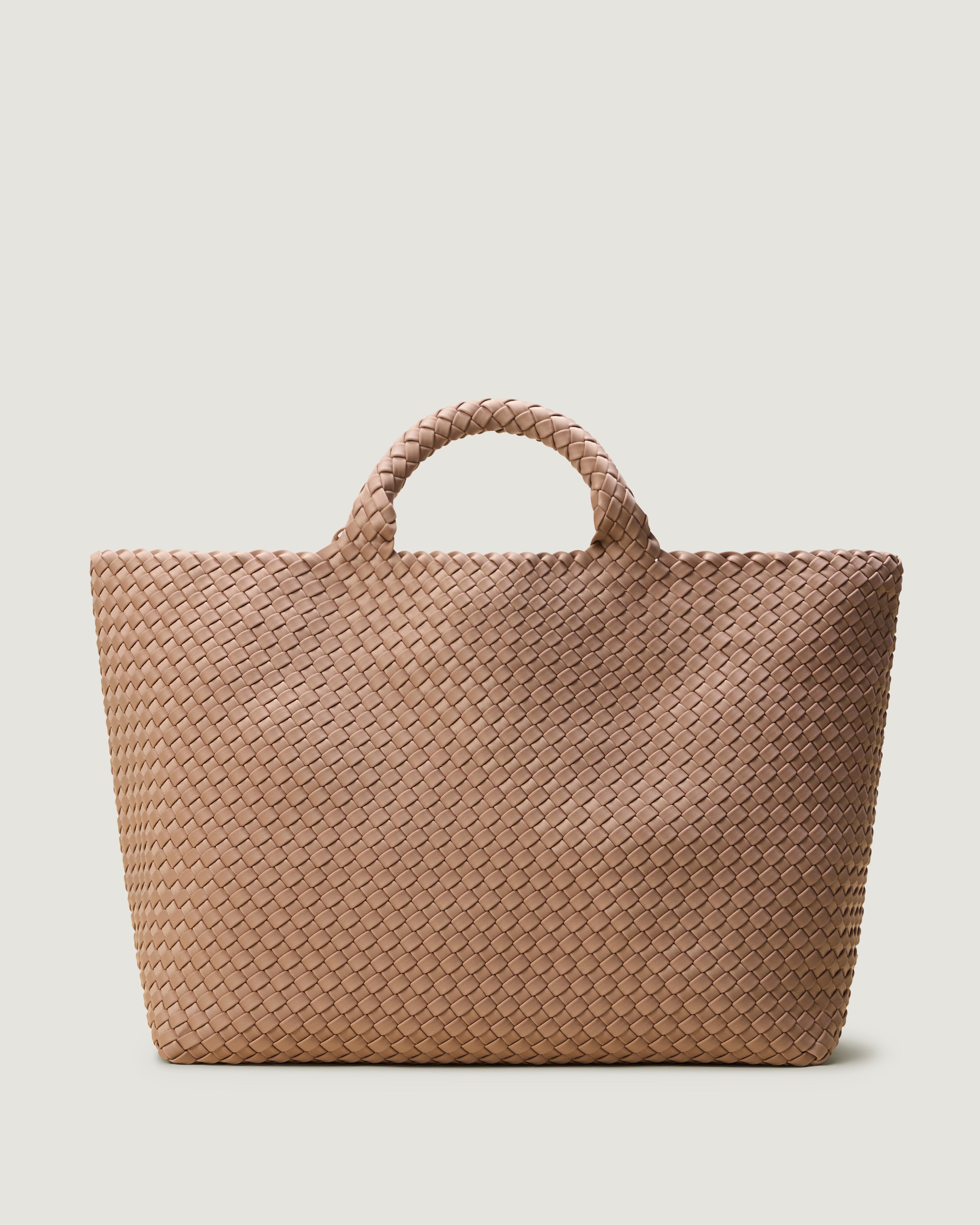 St. Barths Tote in Seychelles, a mocha tone, in handwoven neoprene, featuring an open top, and woven top handles.