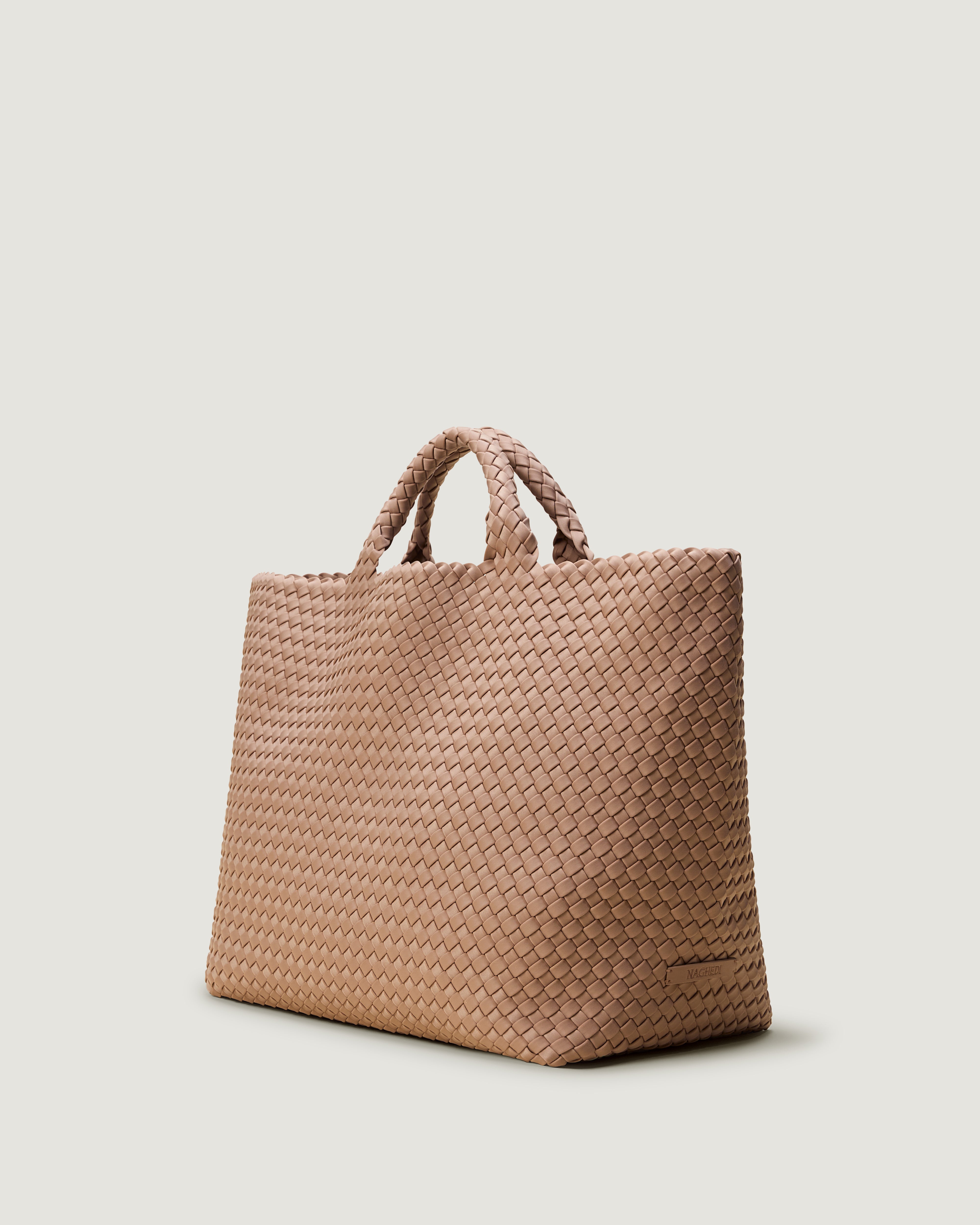 St. Barths Tote in Seychelles shown from a side angle, highlighting its handwoven neoprene construction and open top.