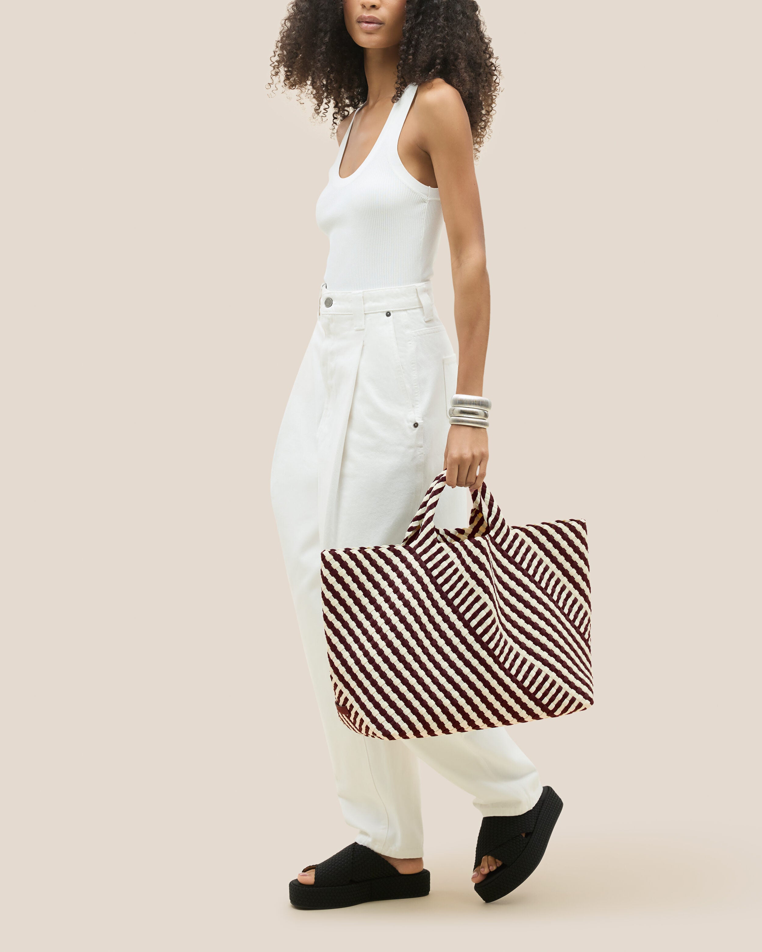 St. Barths Tote in Roma shown on model to illustrate scale and soft silhouette.