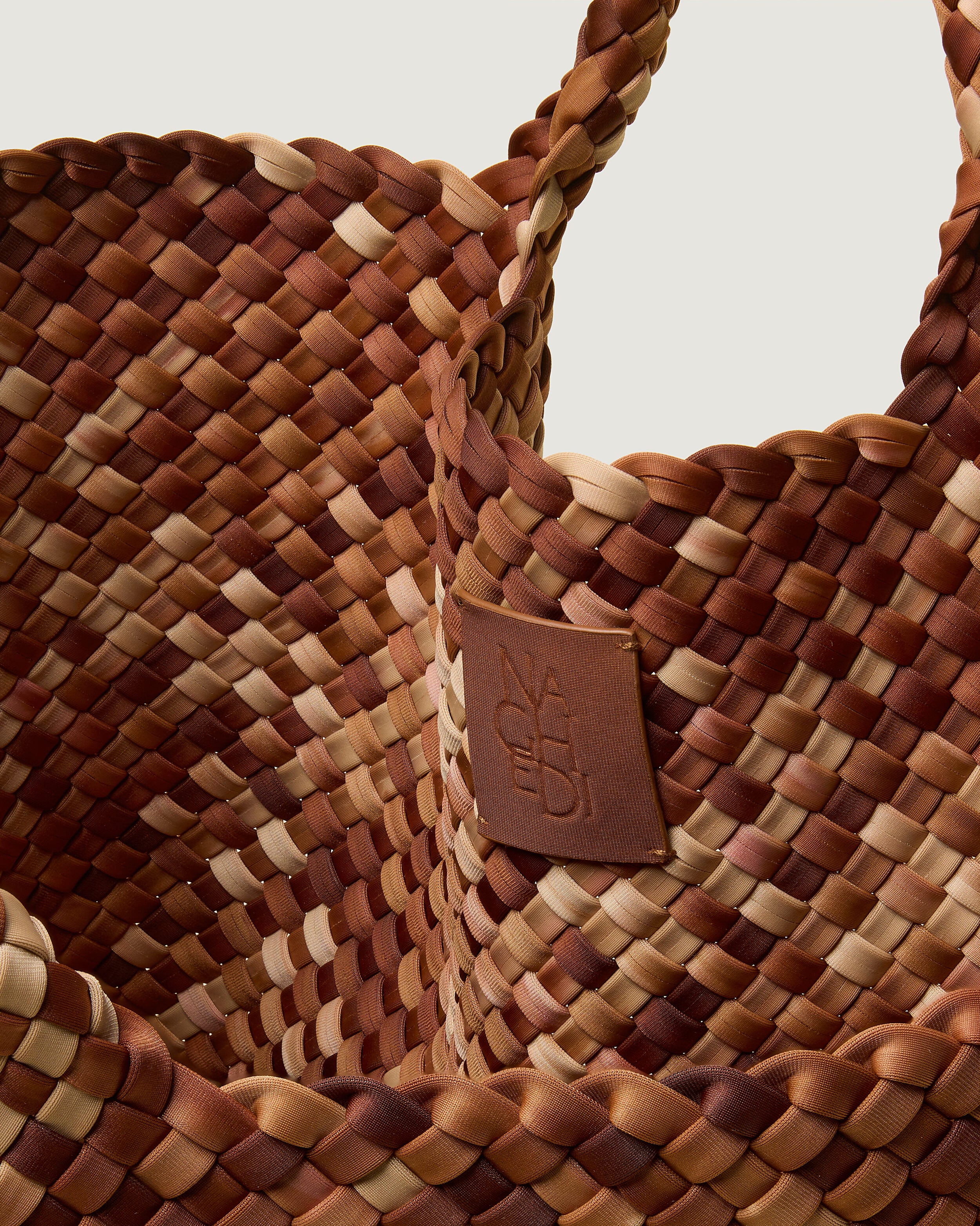 Interior close-up of St. Barths Tote in Fez showing its open top, and unlined interior.