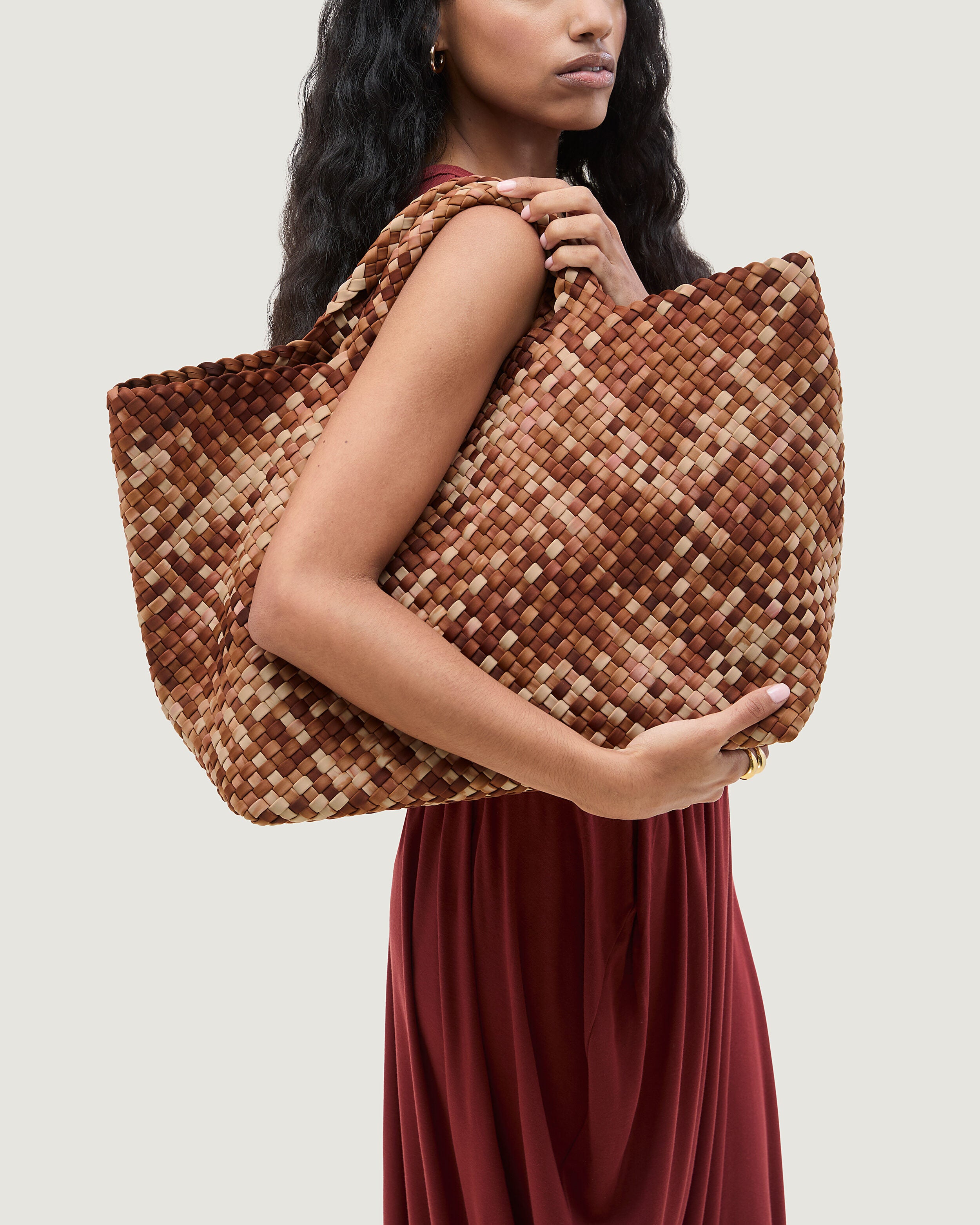St. Barths Tote in Fez shown on model to illustrate scale and soft silhouette.