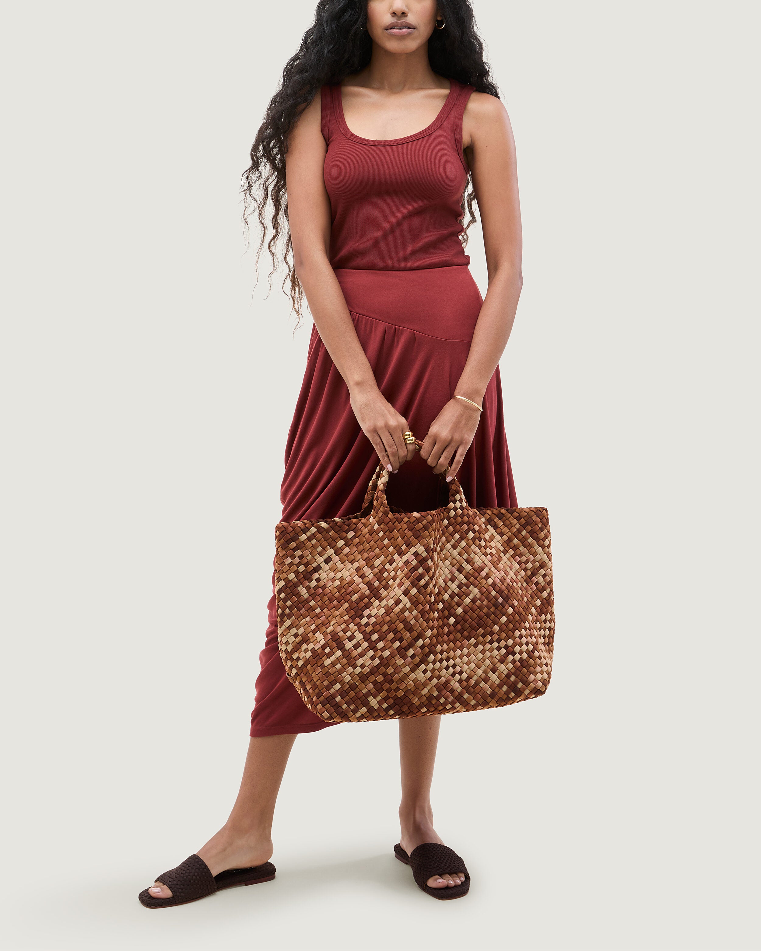 St. Barths Tote in Fez shown on model to illustrate scale and soft silhouette.