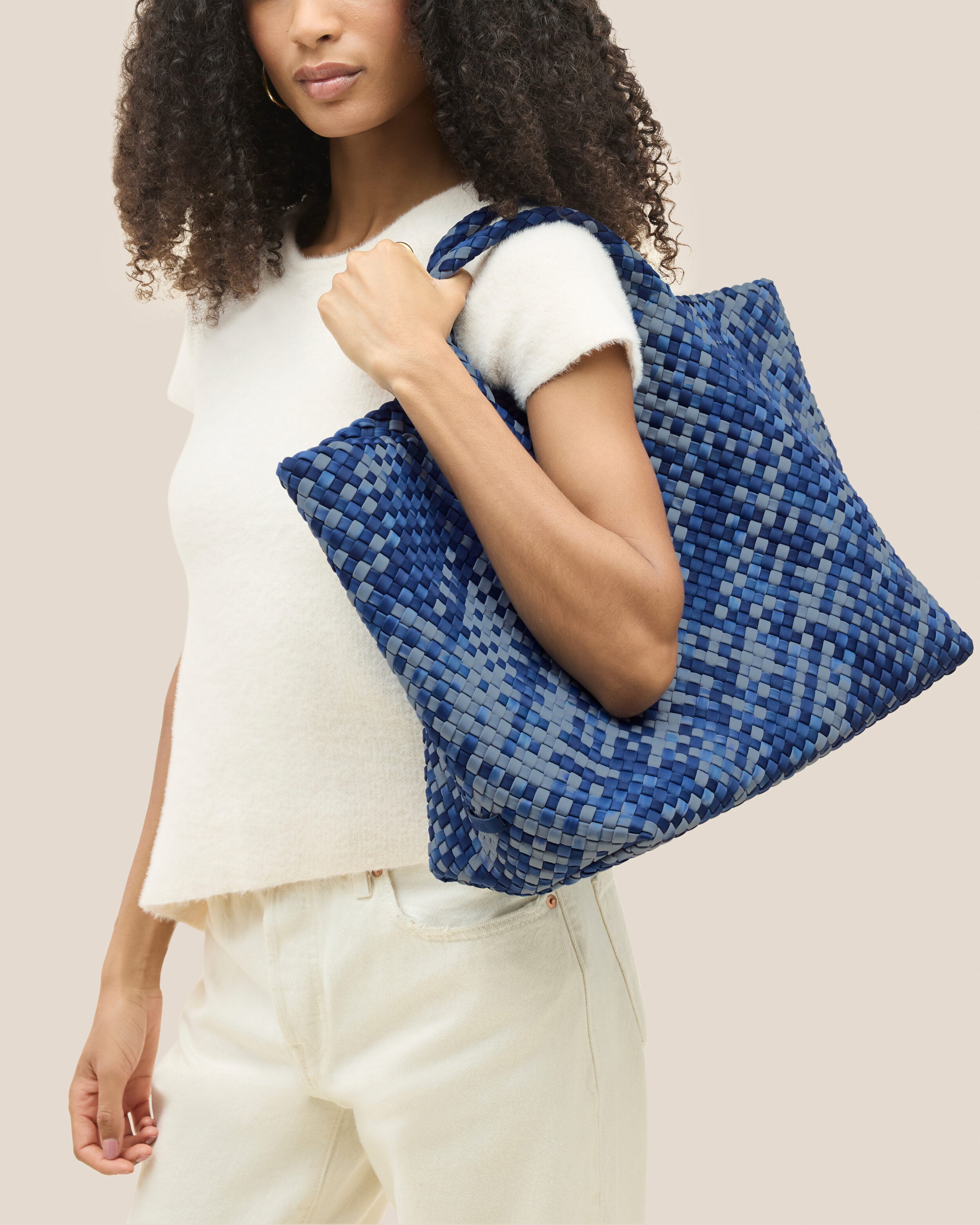 St. Barths Tote in Paros shown on model to illustrate scale and soft silhouette.