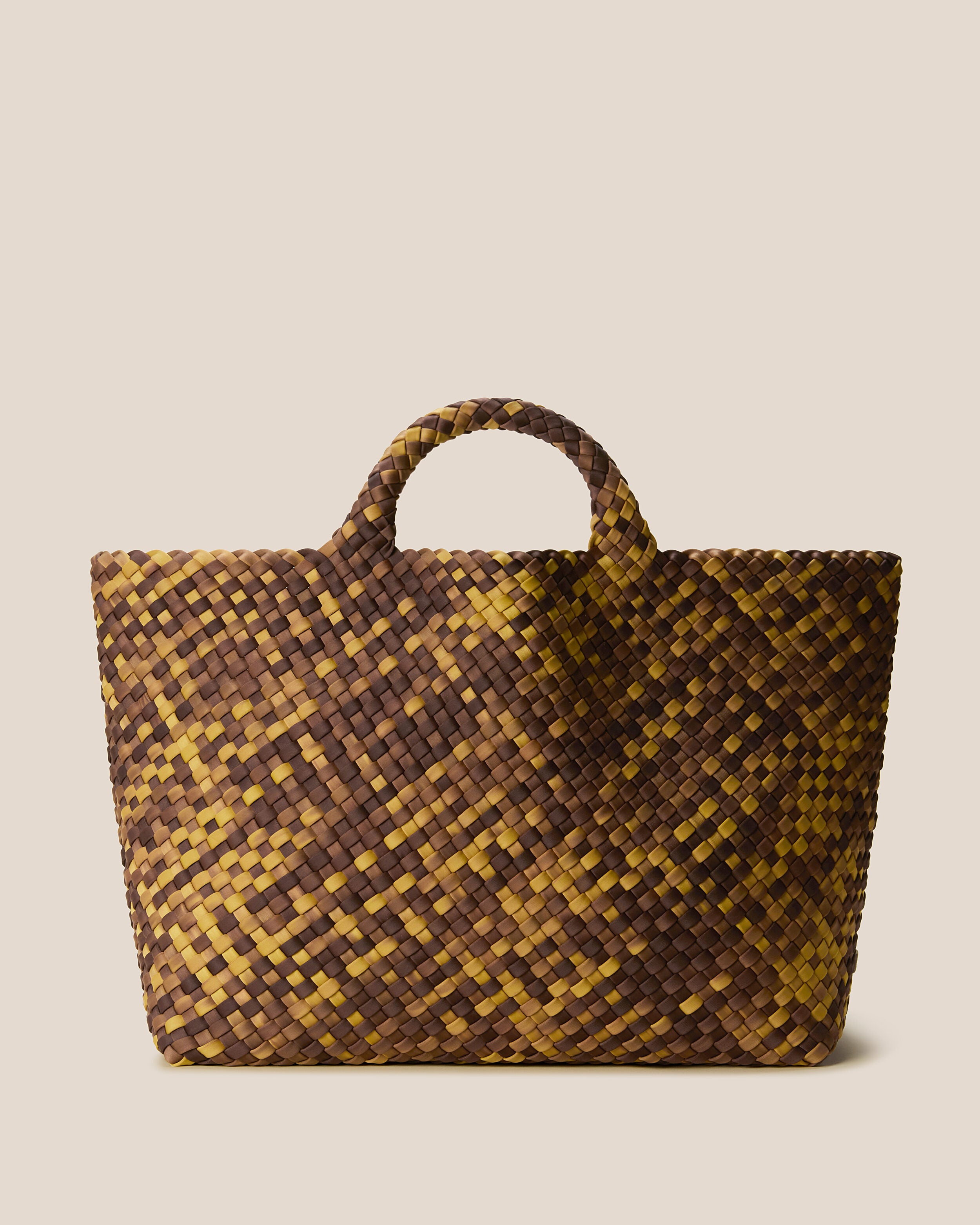 St. Barths Tote in Tortoiseshell, a mustard gold and dark chocolate brown tone, in handwoven neoprene, featuring an open top, and woven top handles.