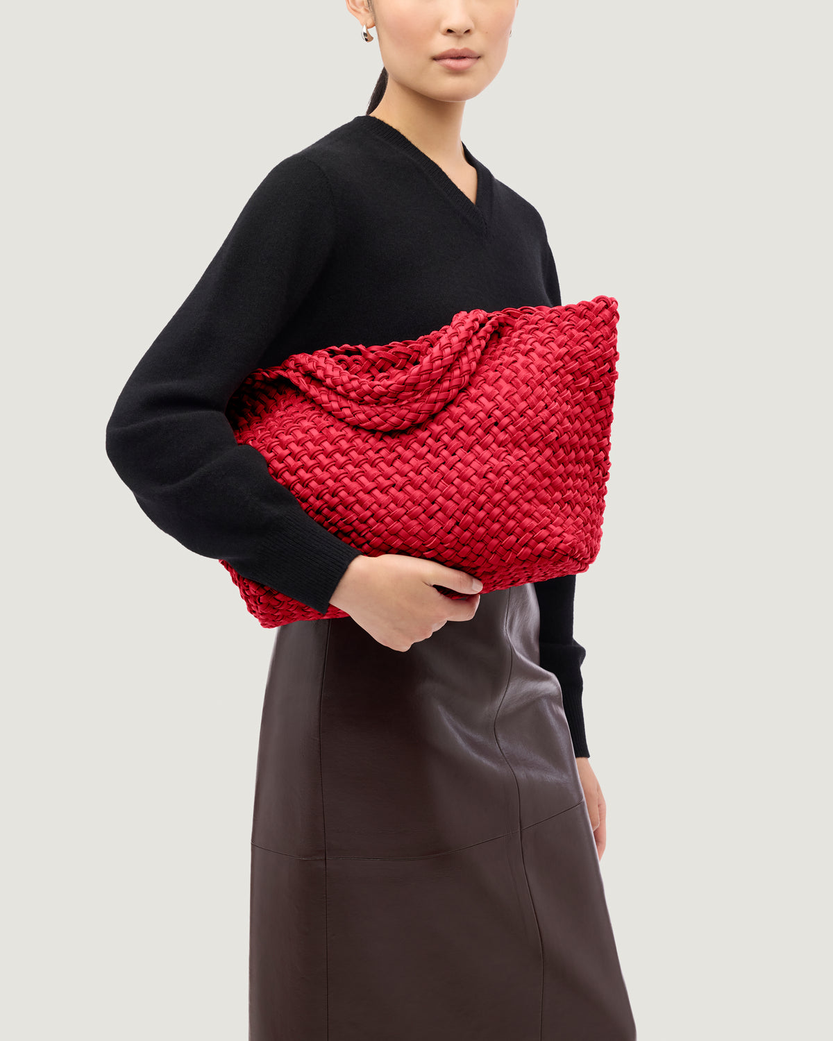 St. Barths Tote in Cerise shown on model to illustrate scale and soft silhouette.
