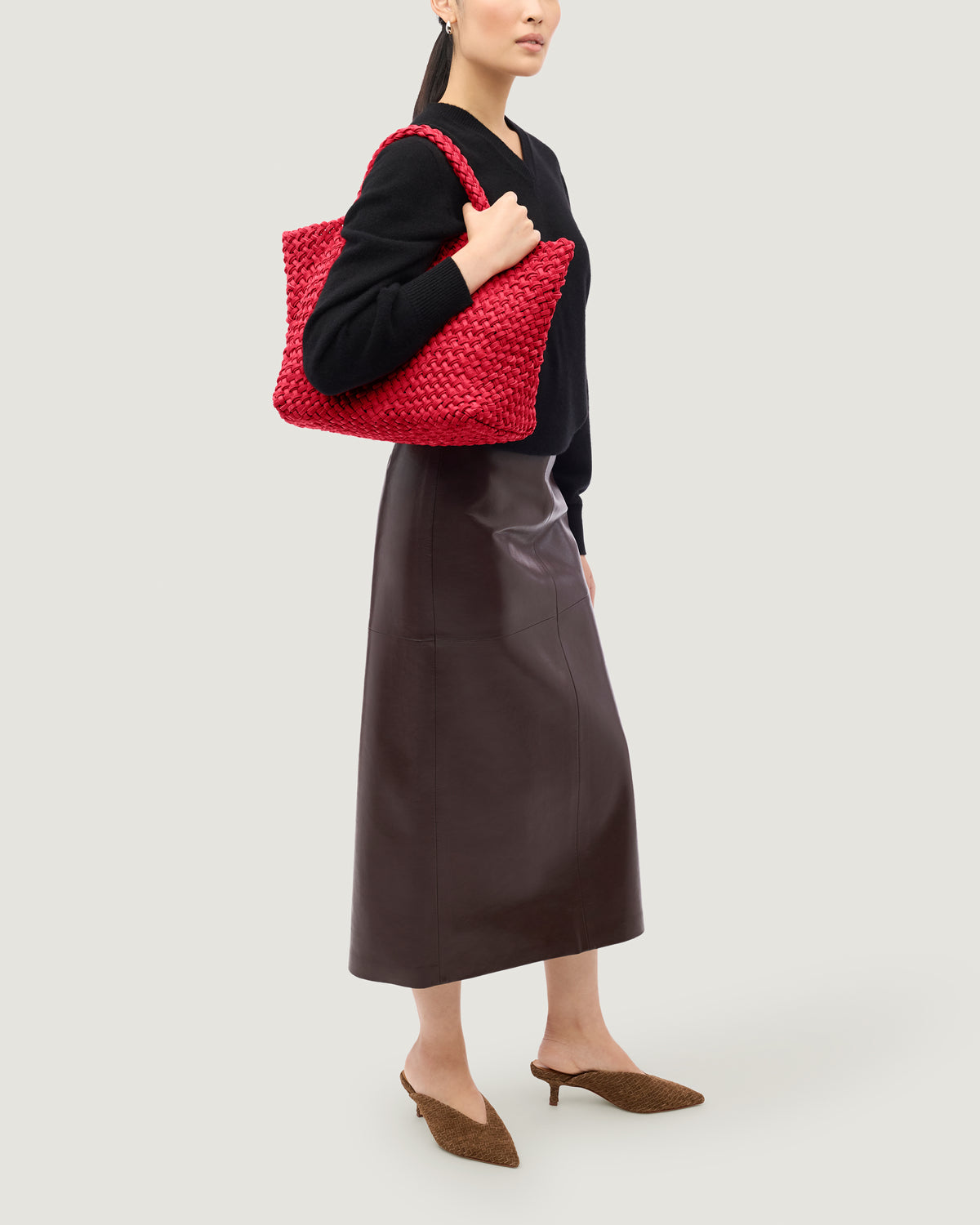 St. Barths Tote in Cerise shown on model to illustrate scale and soft silhouette.
