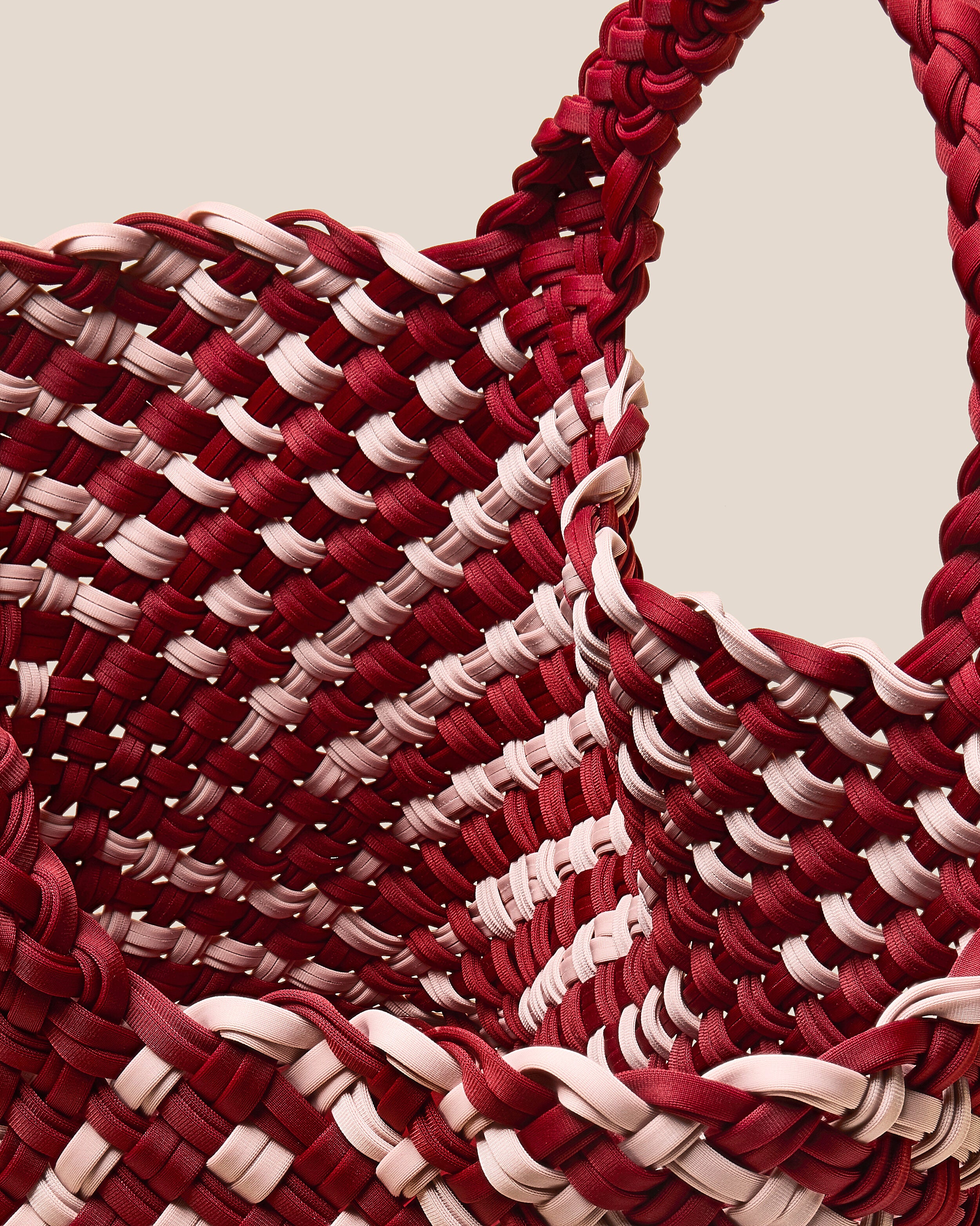 Interior close-up of St. Barths Tote in Lychee showing its open top, and unlined interior.