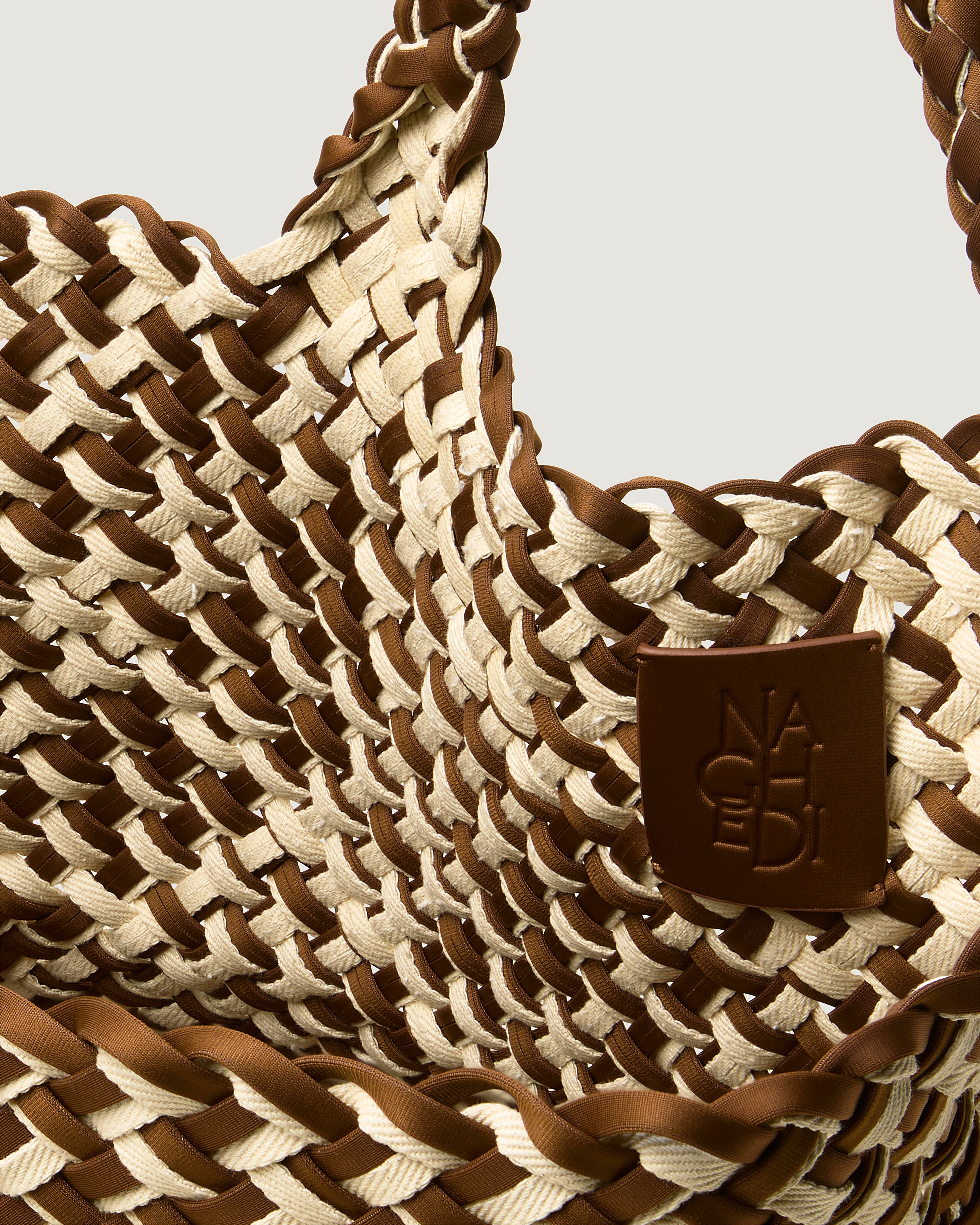 Interior close-up of St. Barths Tote in Carmel showing its open top, and unlined interior.