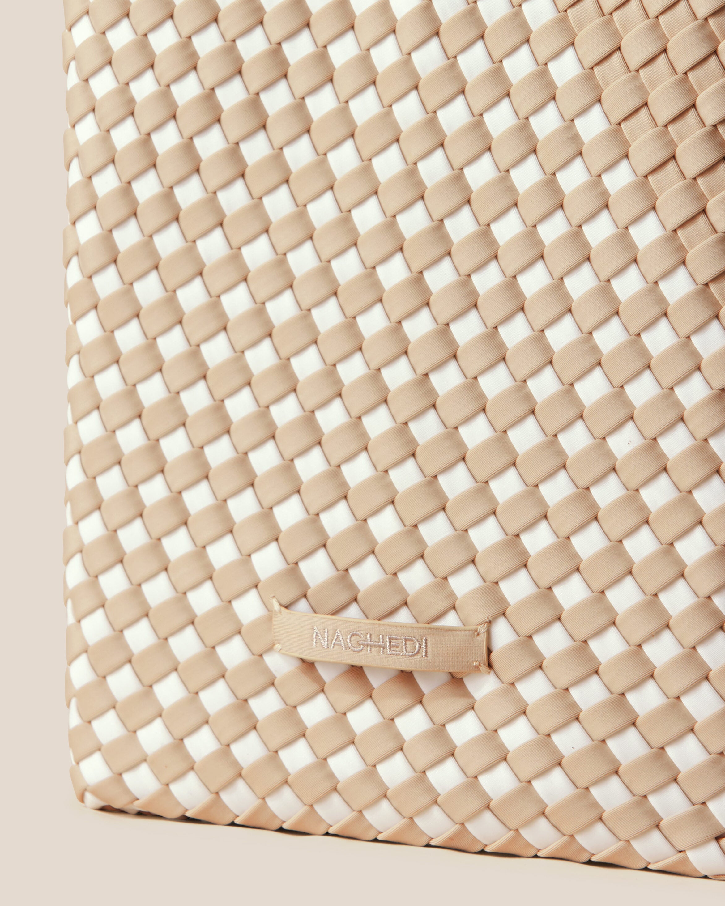 Close-up of stamped NAGHEDI logo on St. Barths Tote in Athena.