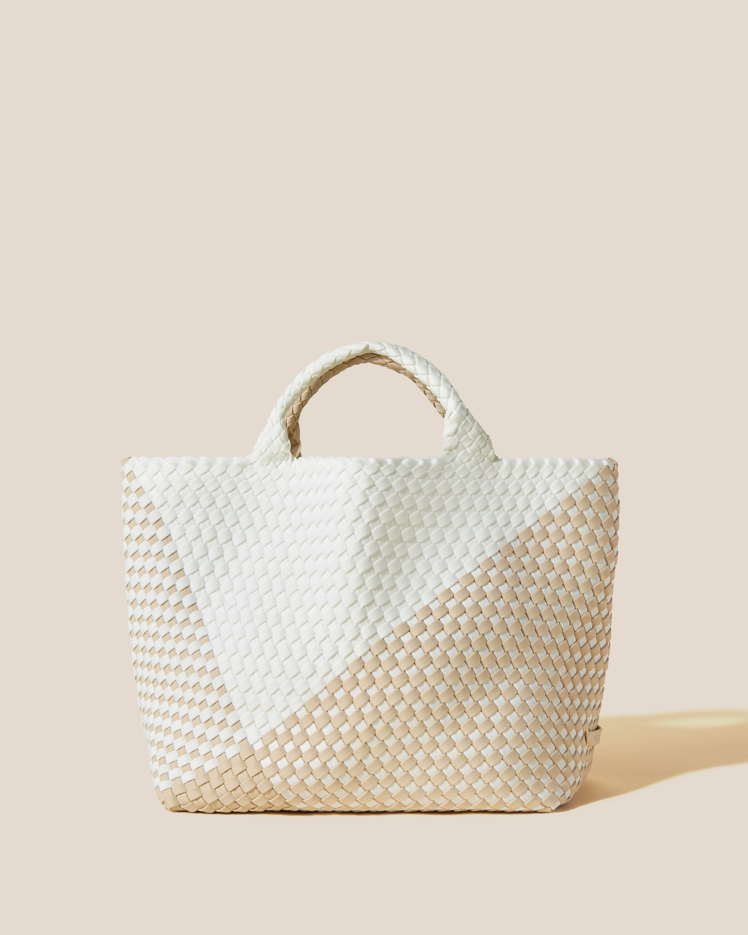 St. Barths Tote in Athena, a white and cream tone, in handwoven neoprene, featuring an open top, and woven top handles.