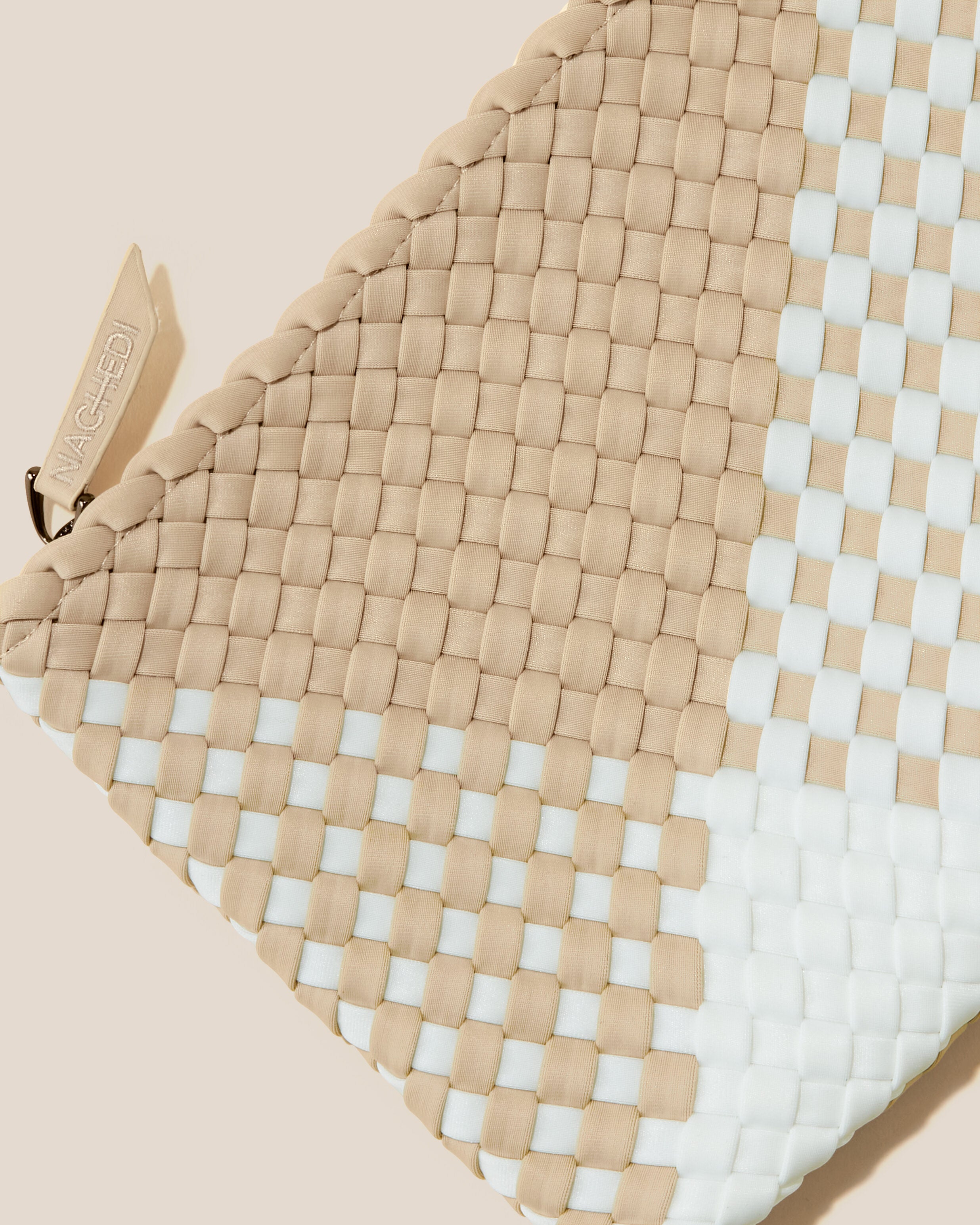 Close-up of included matching woven zippered pouch.