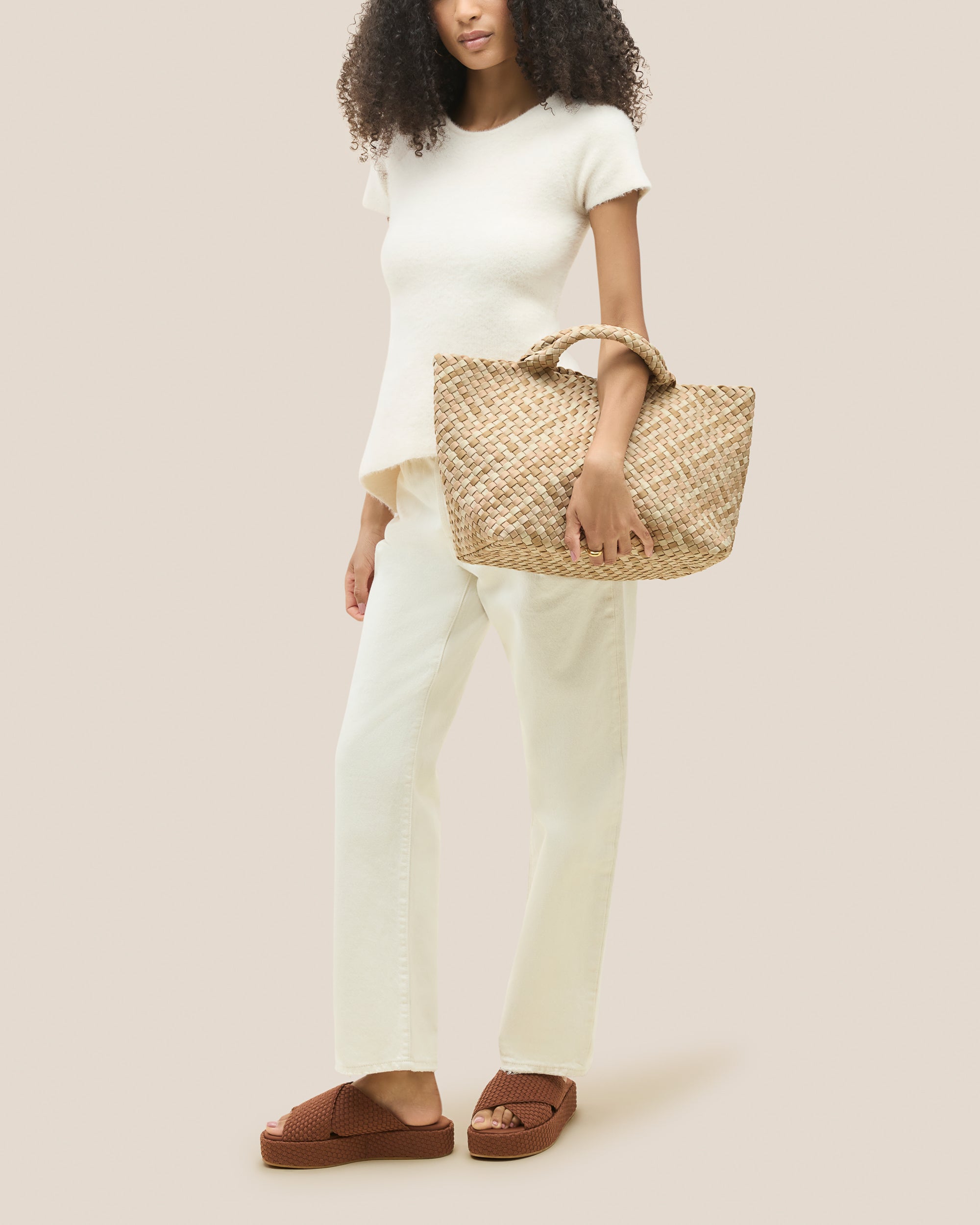 St. Barths Tote in Lanai shown on model to illustrate scale and soft silhouette.