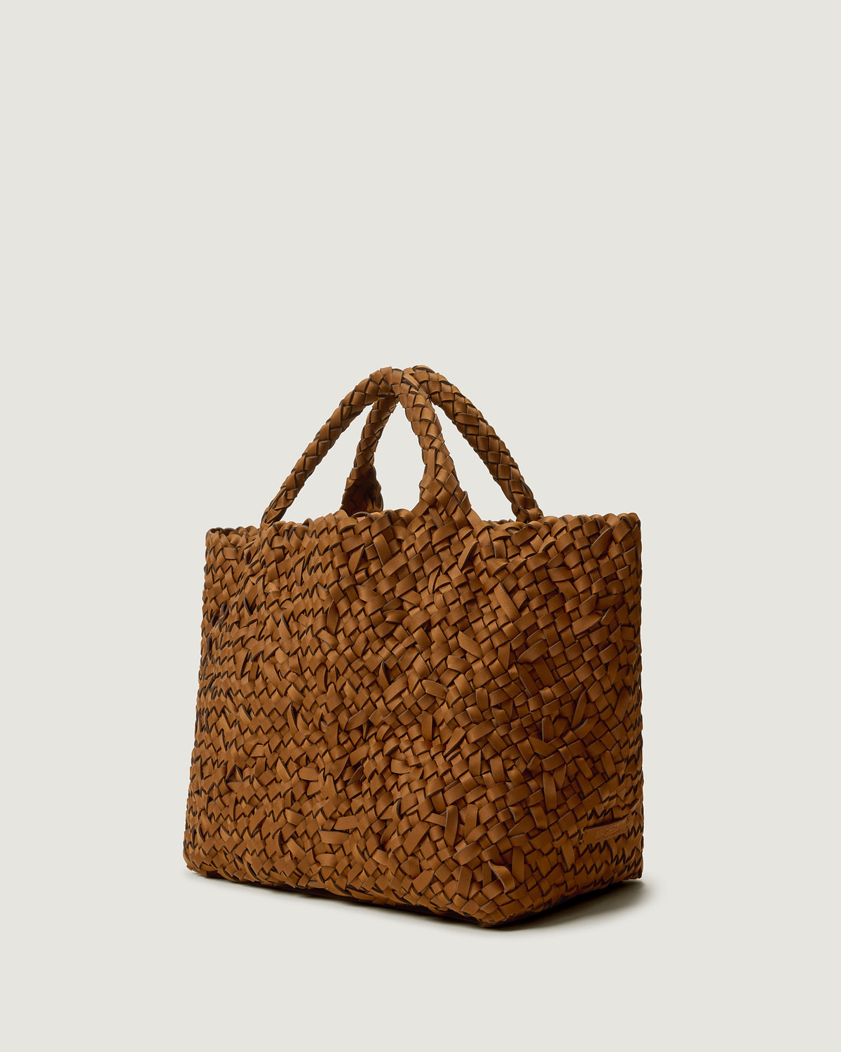 Side view of St. Barths Tote Nest Weave in Teak, a saddle brown tone.