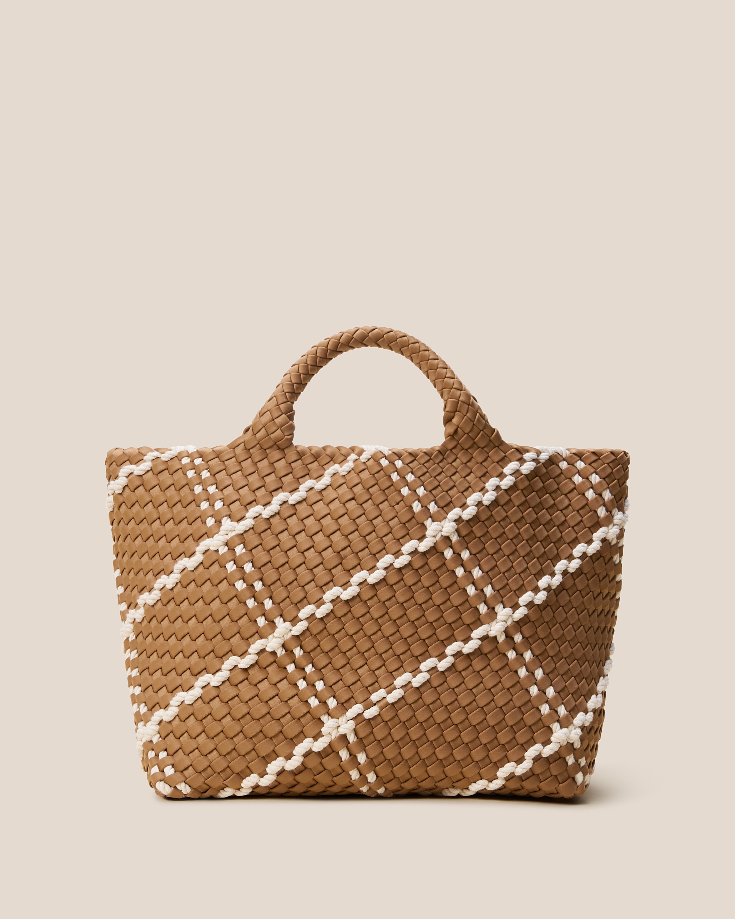 St. Barths Tote in Cove, a tan brown tone, in handwoven neoprene, featuring an open top, and woven top handles.
