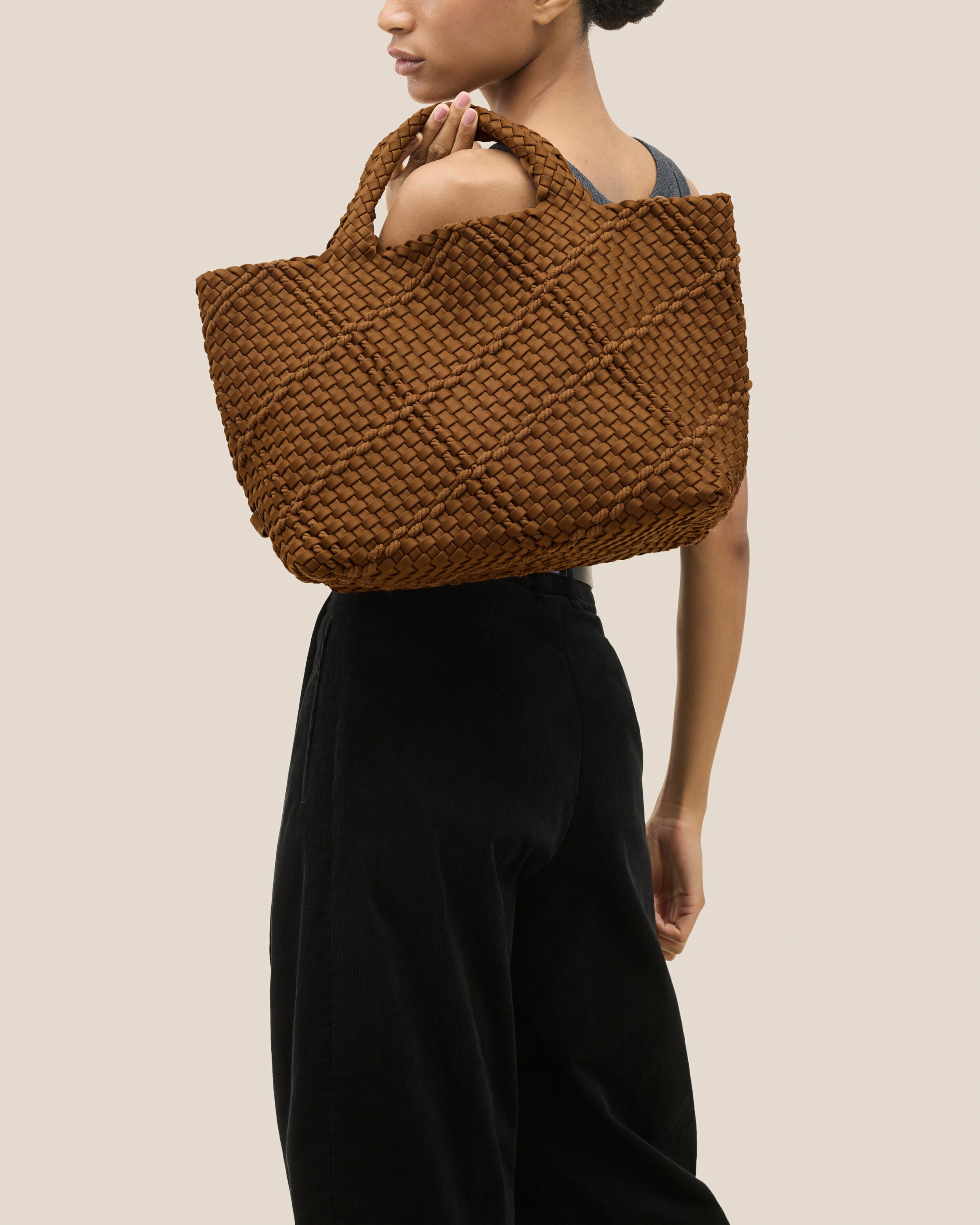 St. Barths Tote in Harbor shown on model to illustrate scale and soft silhouette.