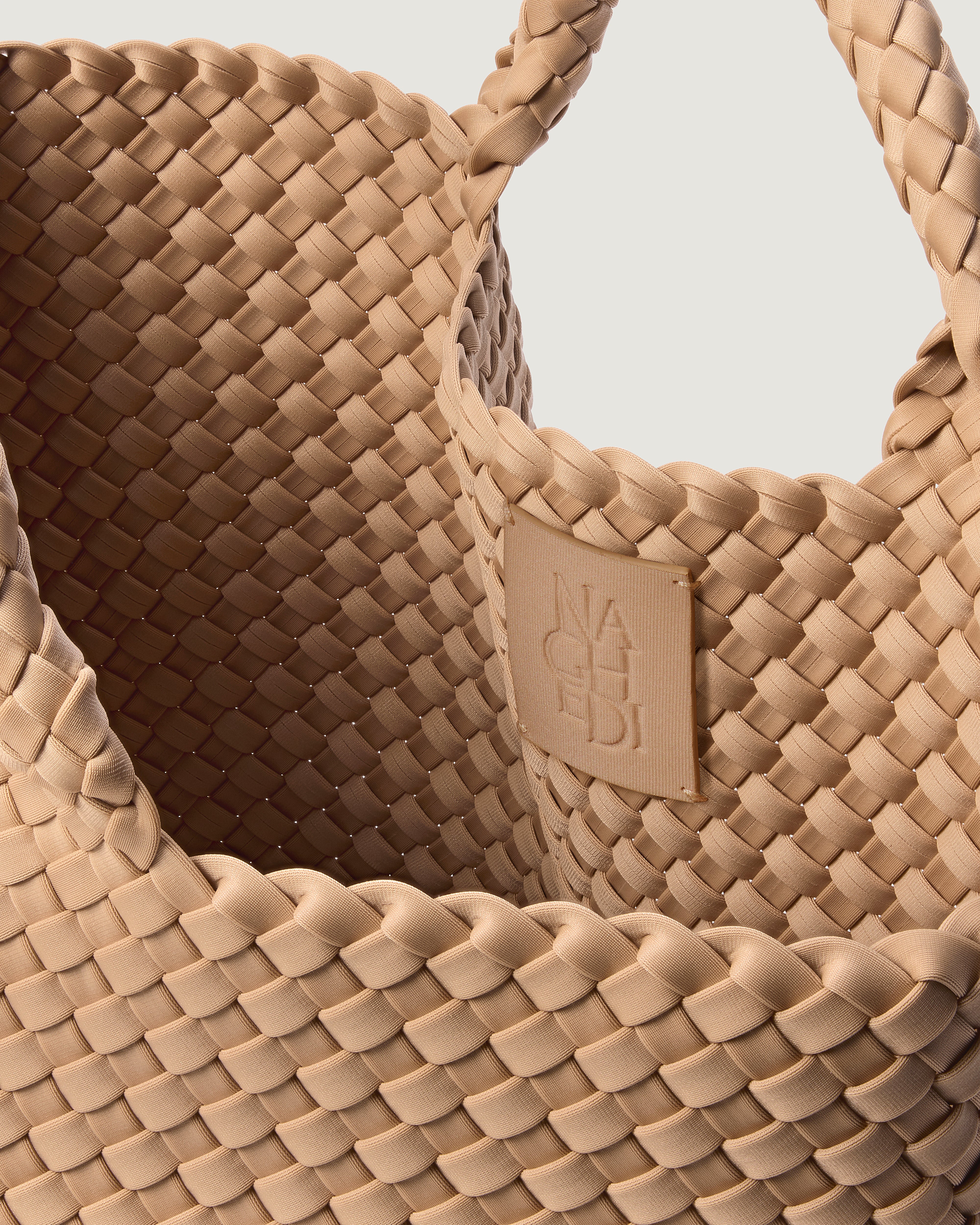 Interior close-up of St. Barths Tote in Camel showing its open top, and unlined interior.