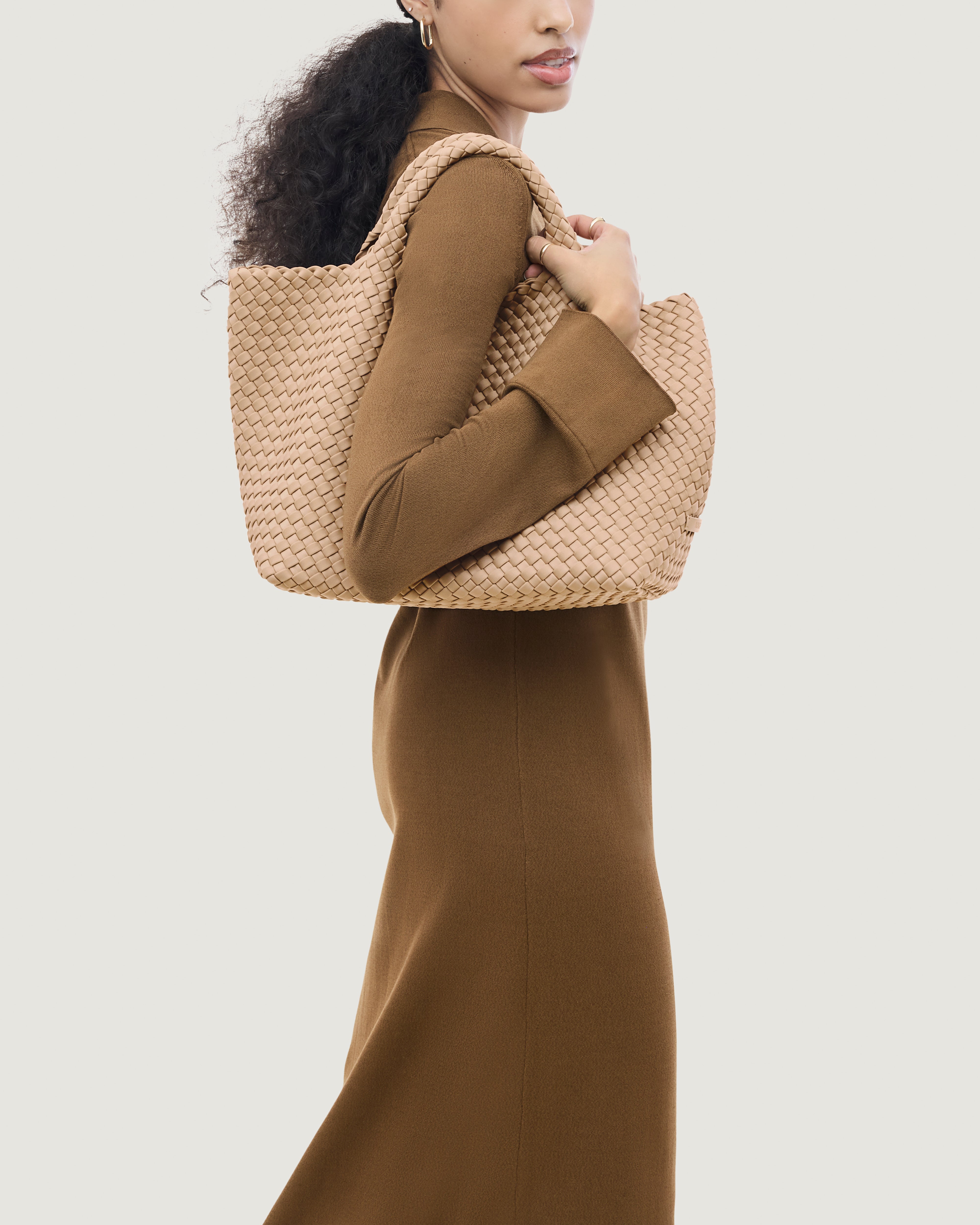 St. Barths Tote in Camel shown on model to illustrate scale and soft silhouette.