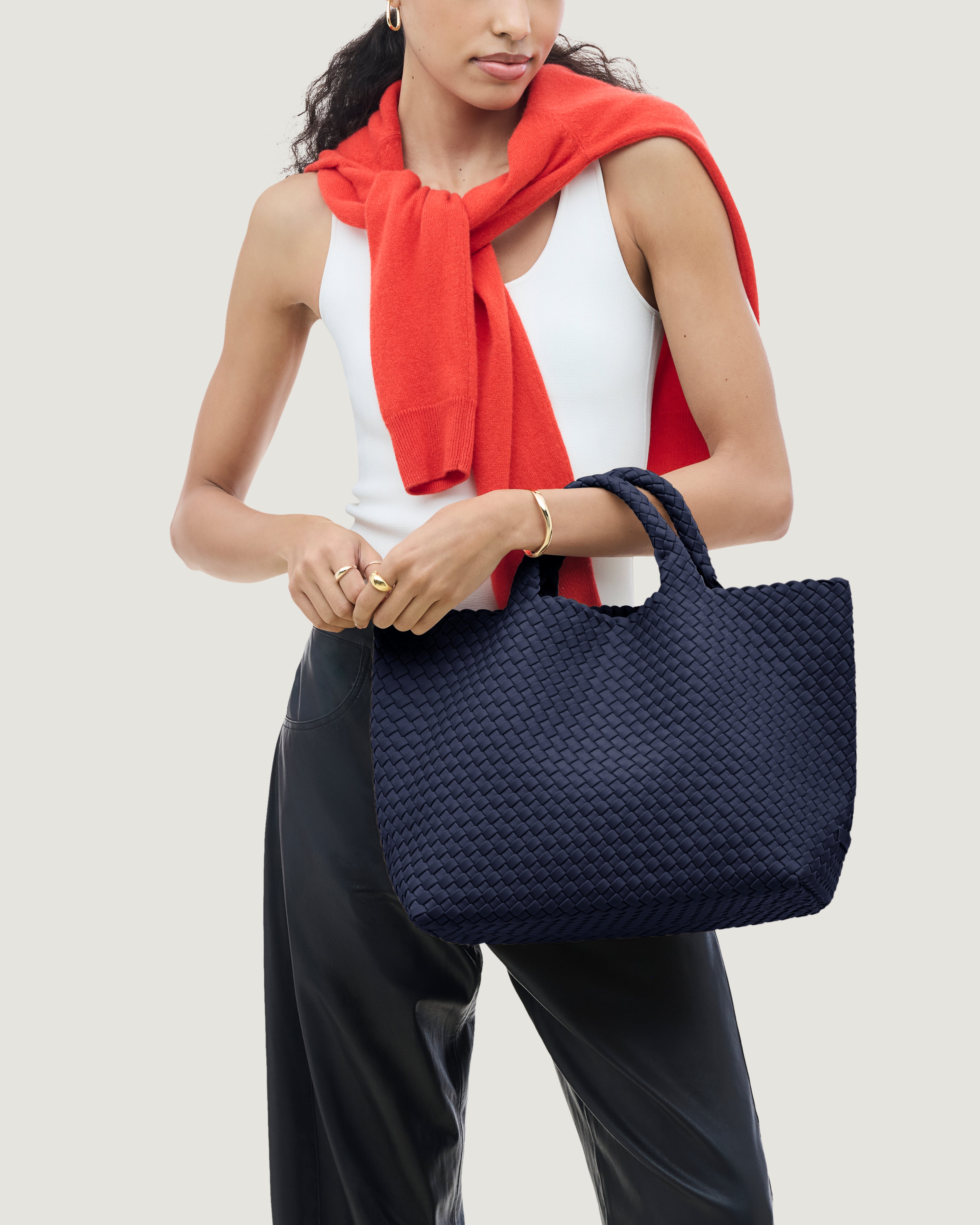 St. Barths Tote in Ink Blue shown on model to illustrate scale and soft silhouette.