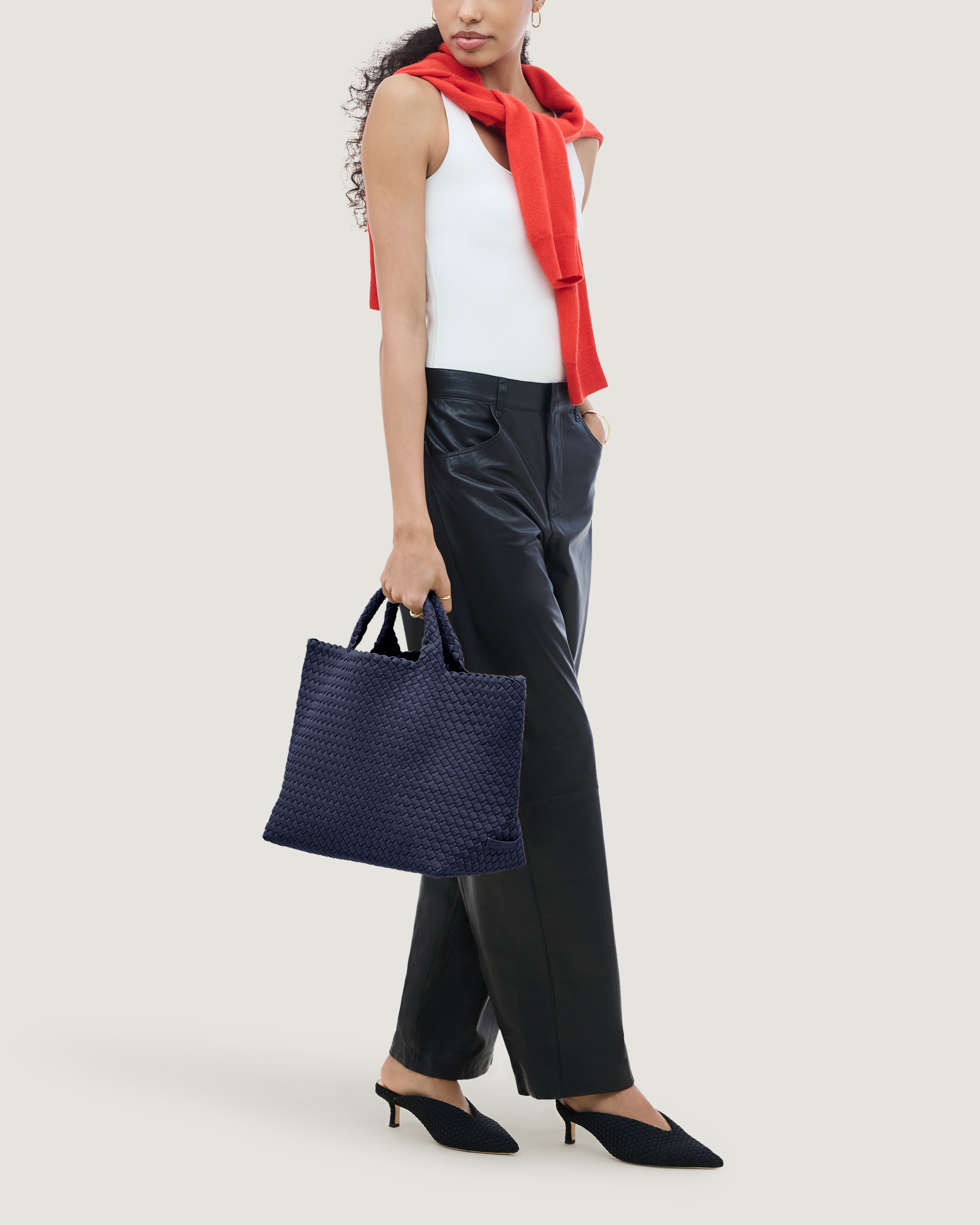 St. Barths Tote in Ink Blue shown on model to illustrate scale and soft silhouette.