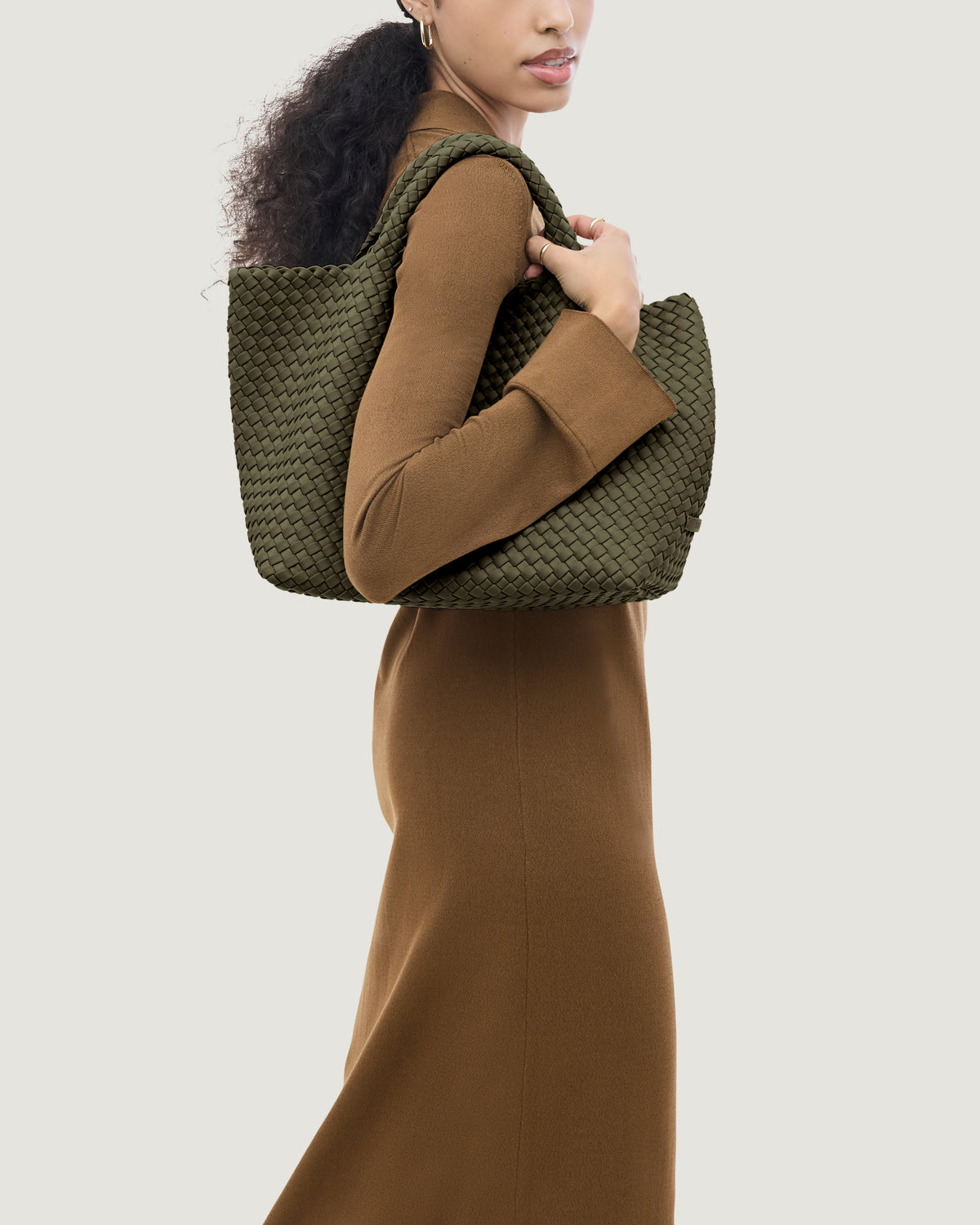 St. Barths Tote in Olive shown on model to illustrate scale and soft silhouette.