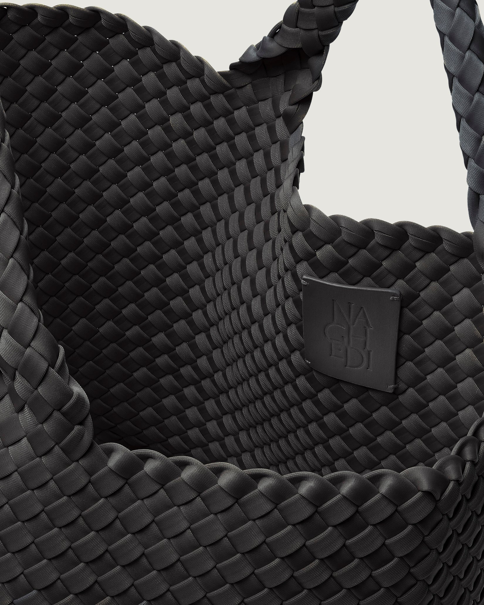 Interior close-up of St. Barths Medium Tote Bag in Ash showing its open top, and unlined interior.