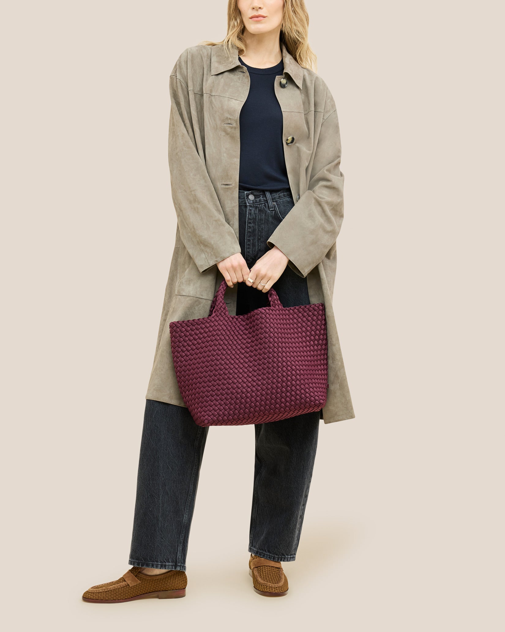 St. Barths Medium Tote Bag in Bordeaux shown on model to illustrate scale and soft silhouette.
