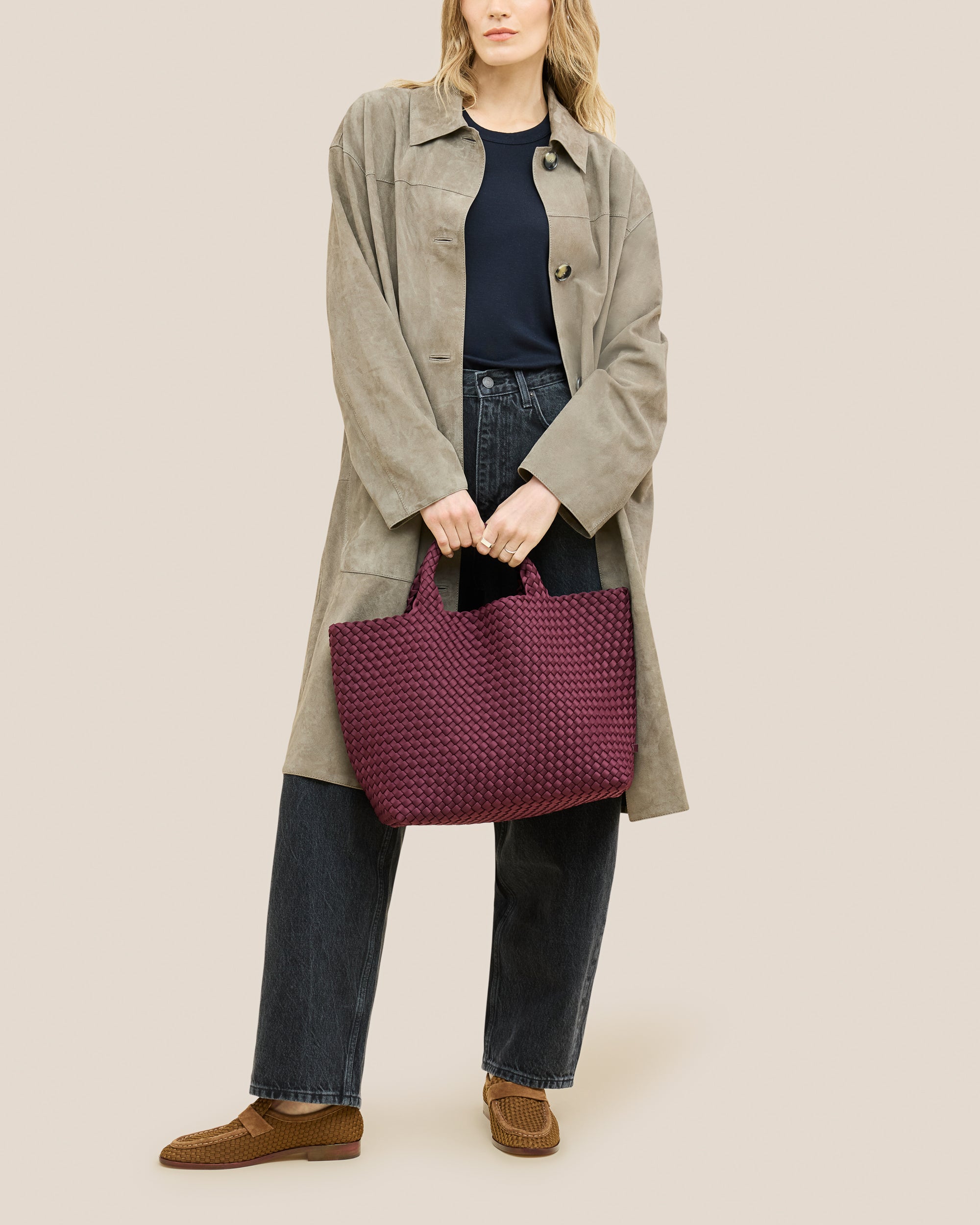 St. Barths Medium Tote Bag in Bordeaux shown on model to illustrate scale and soft silhouette.