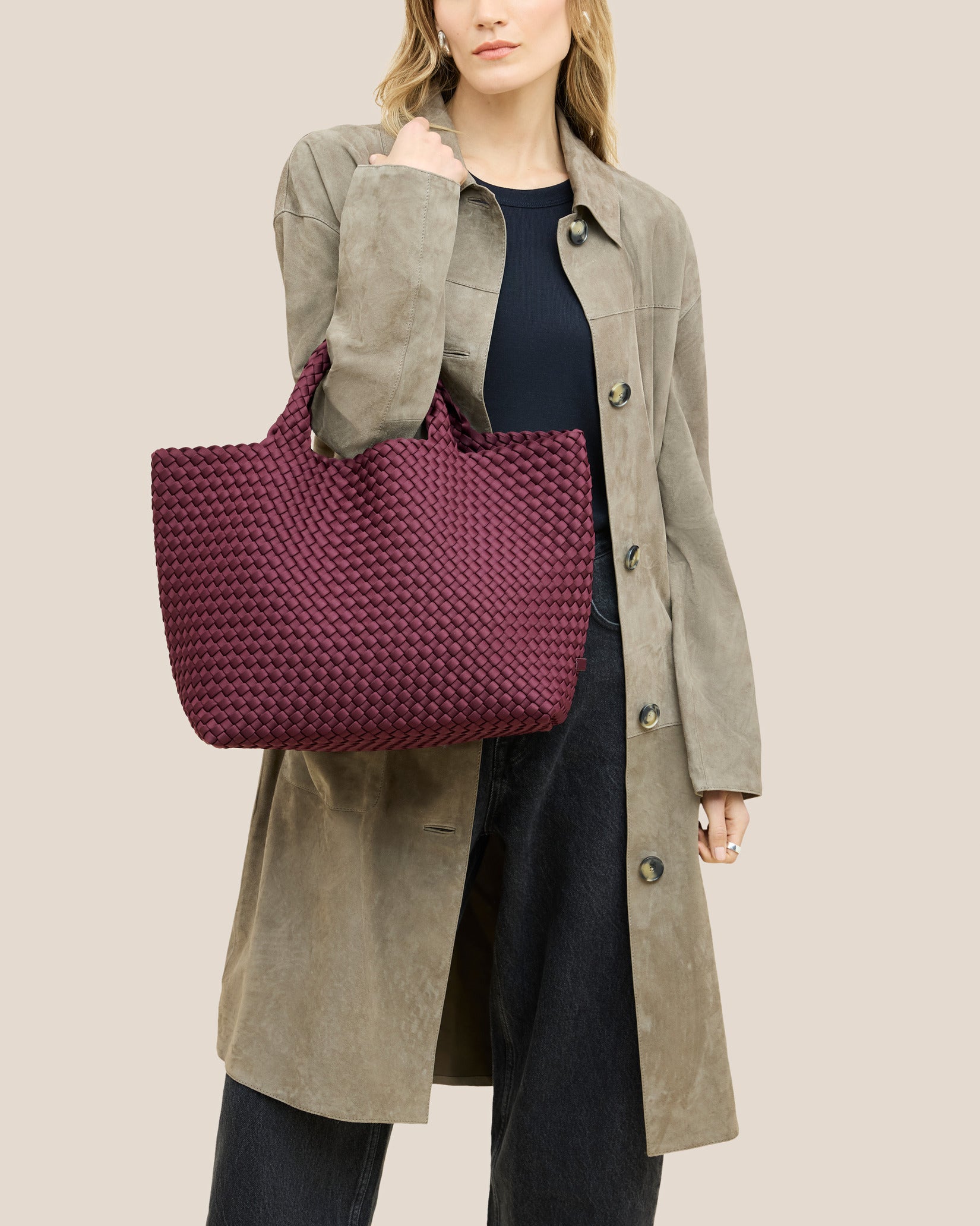 St. Barths Medium Tote Bag in Bordeaux shown on model to illustrate scale and soft silhouette.
