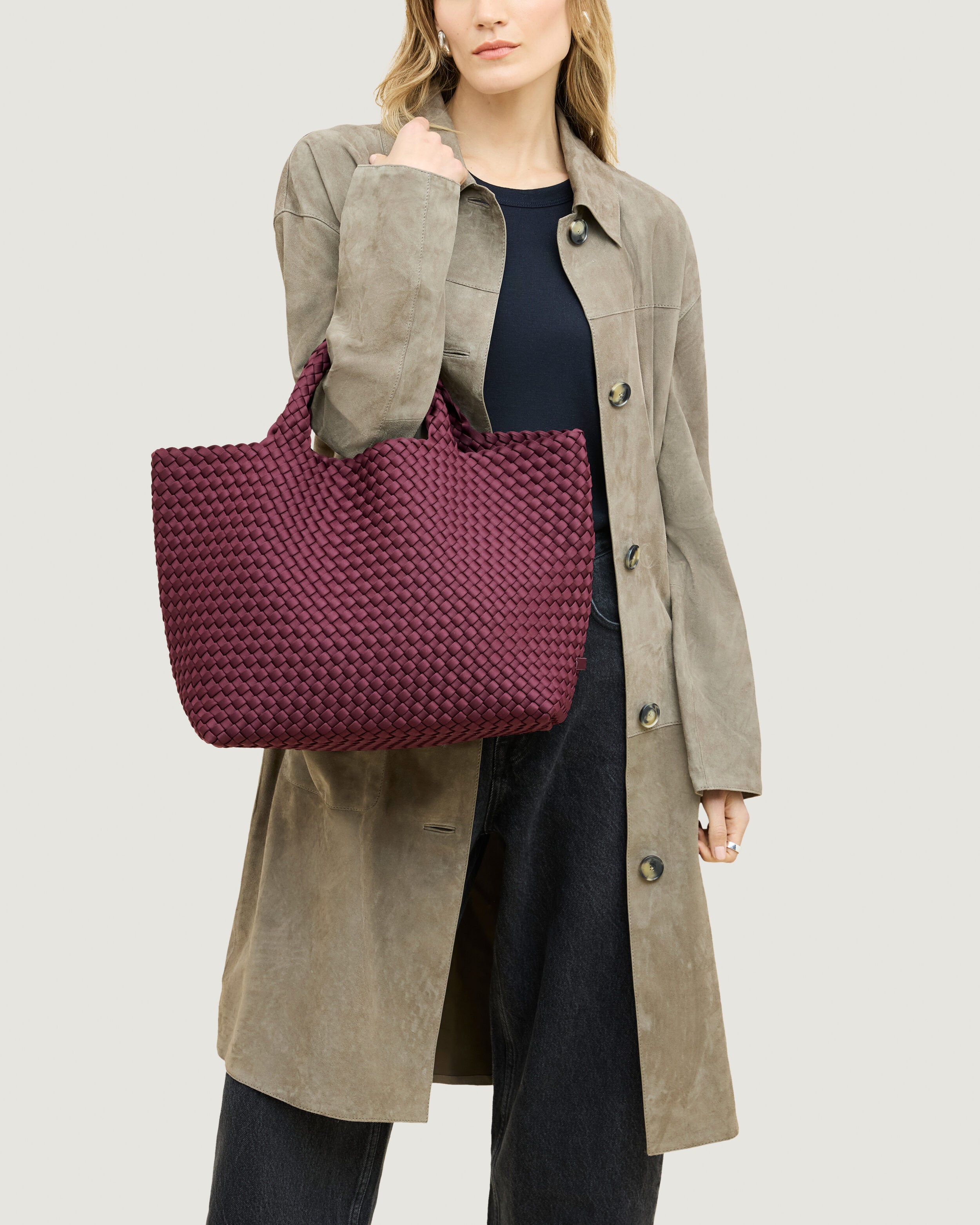 St. Barths Tote in Bordeaux shown on model to illustrate scale and soft silhouette.