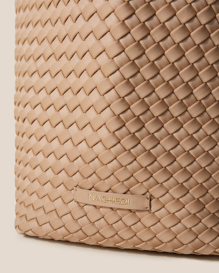 Close-up of stamped NAGHEDI logo on St. Barths Tote in Camel.