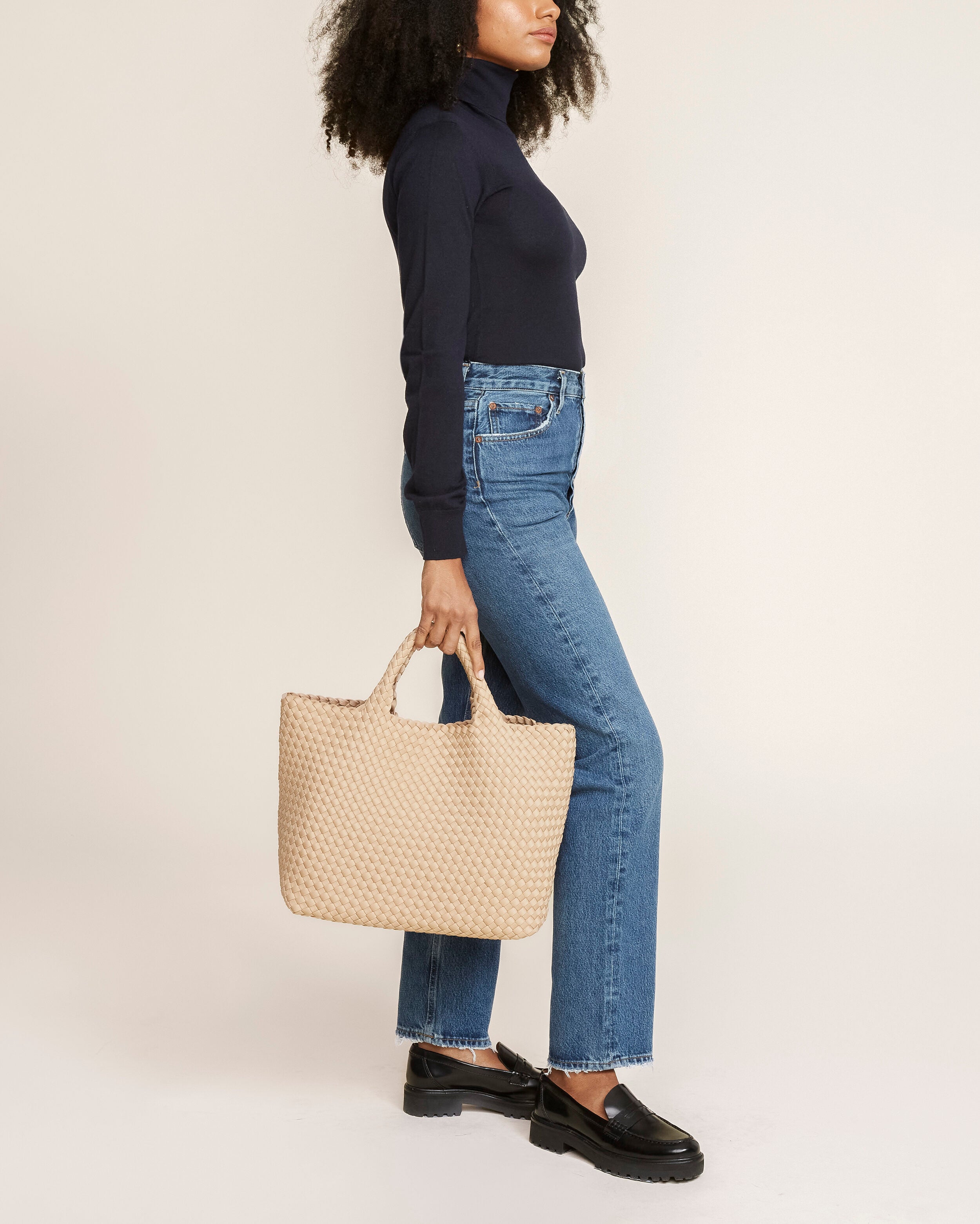 St. Barths Tote in Camel shown on model to illustrate scale and soft silhouette.