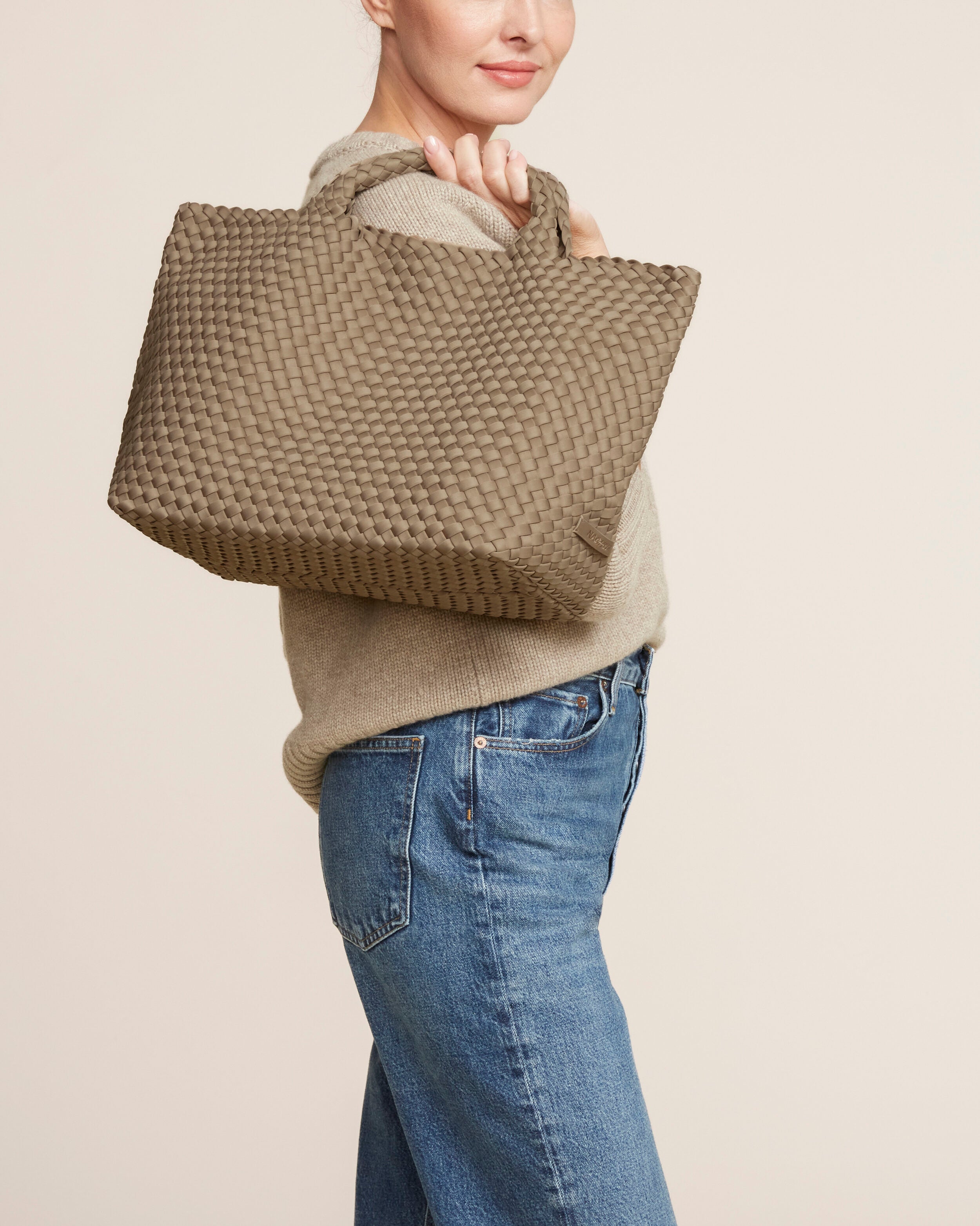 St. Barths Tote in Cashmere shown on model to illustrate scale and soft silhouette.