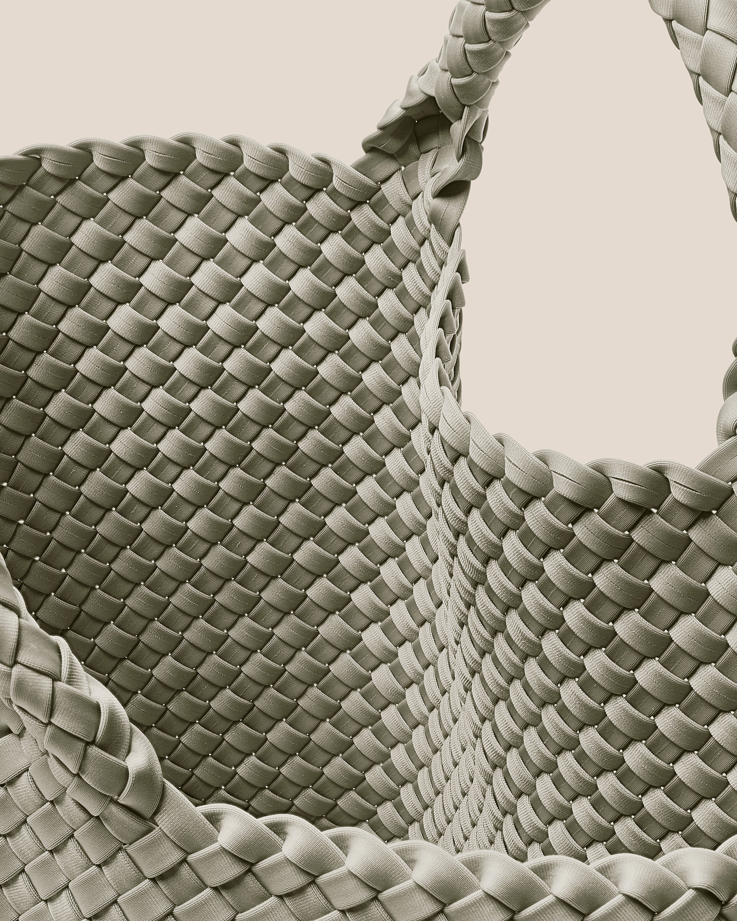 Interior close-up of St. Barths Tote in Celadon showing its open top, and unlined interior.