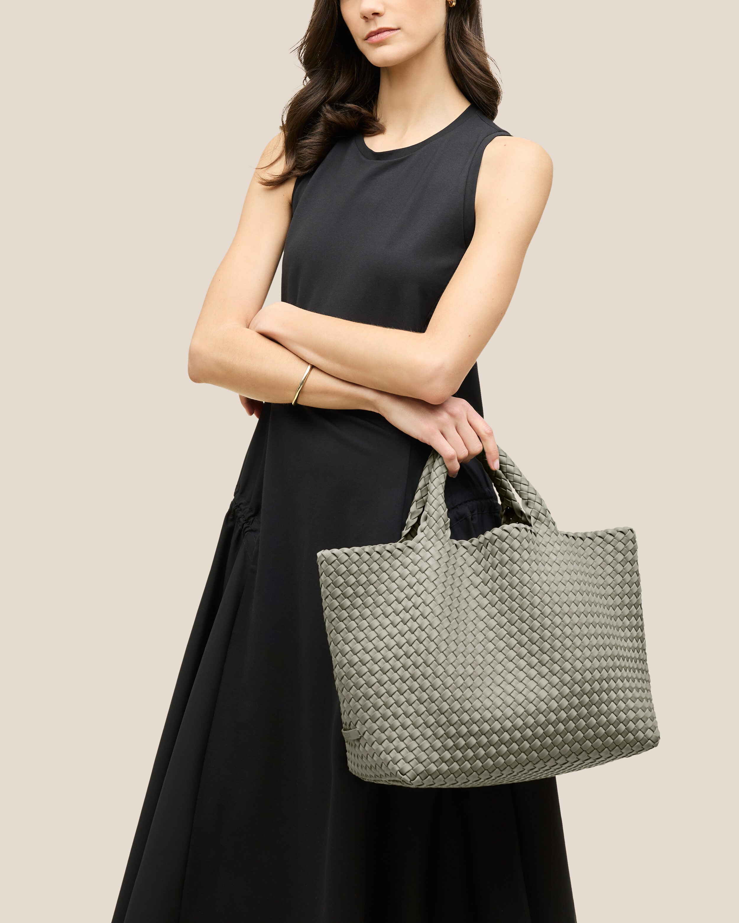 St. Barths Tote in Celadon shown on model to illustrate scale and soft silhouette.