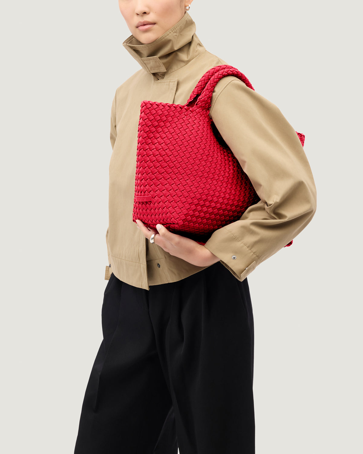 St. Barths Tote in Cerise shown on model to illustrate scale and soft silhouette.