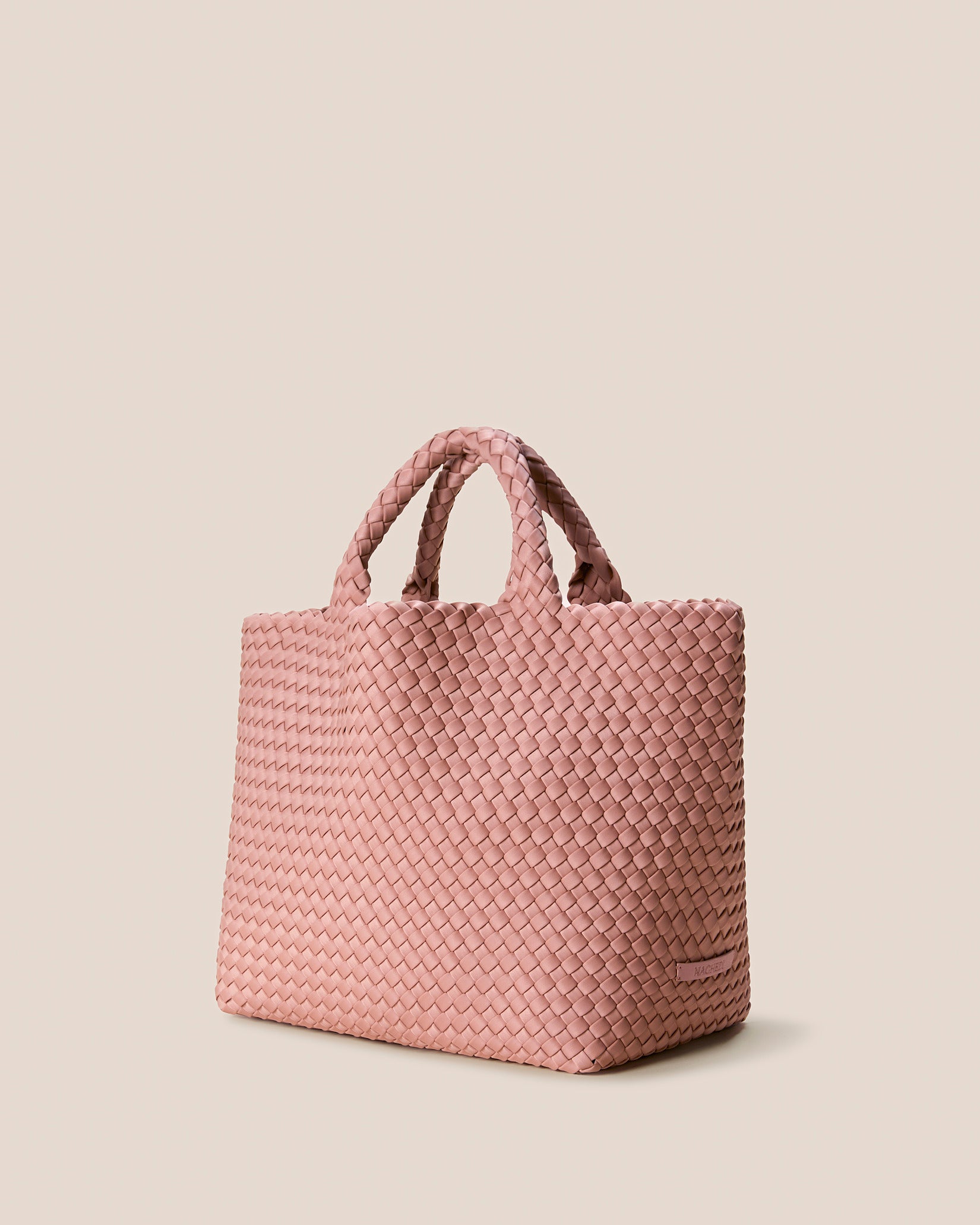 St. Barths Medium Tote Bag in Dusk shown from a side angle, highlighting its handwoven neoprene and open top.