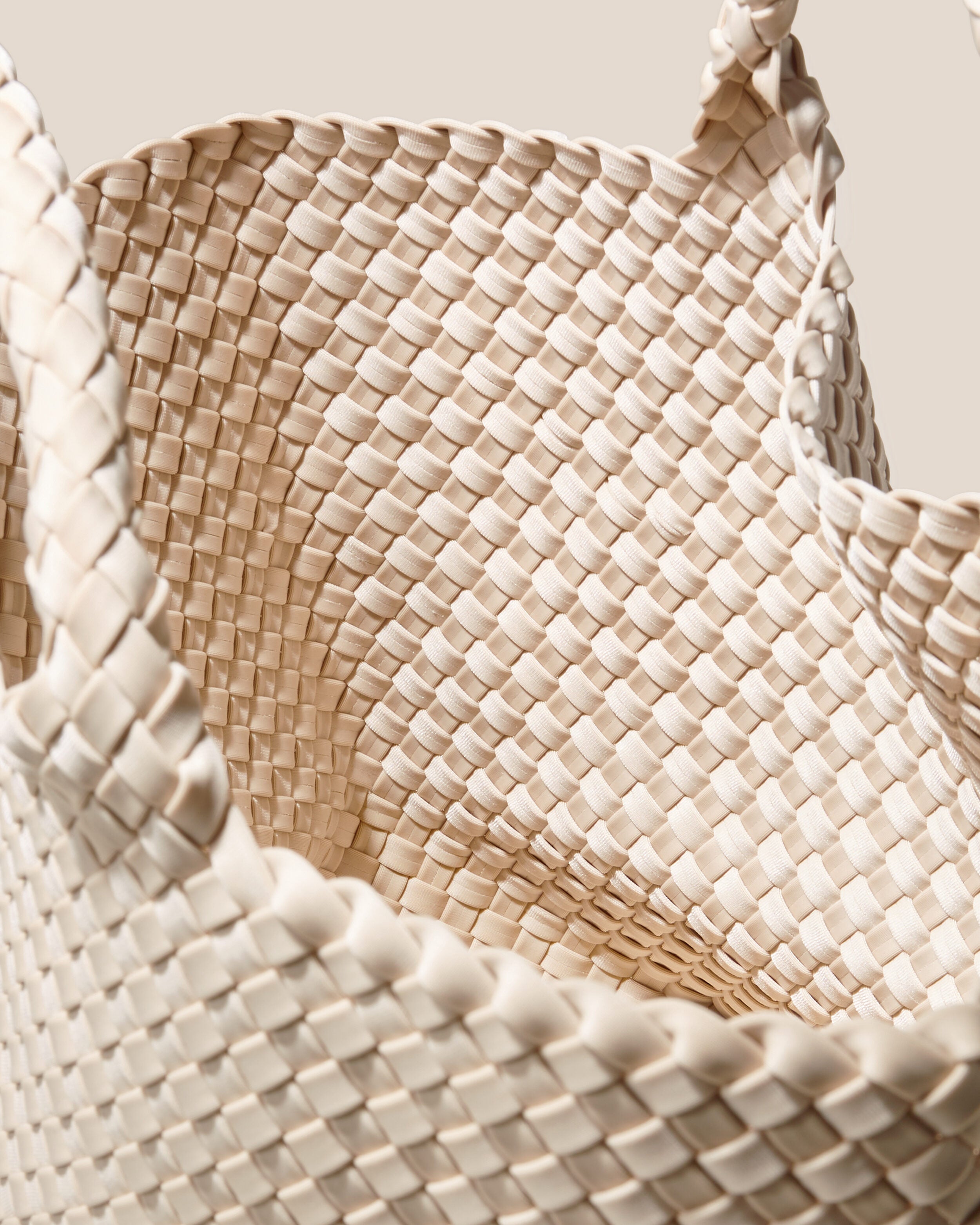 Interior close-up of St. Barths Tote in Ecru showing its open top, and unlined interior.