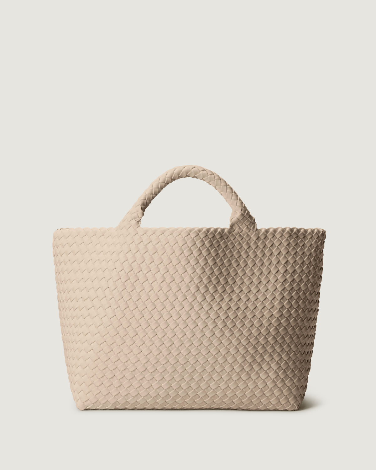 St. Barths Tote in Ecru in handwoven neoprene, featuring a magnetic closure, and woven top handles.