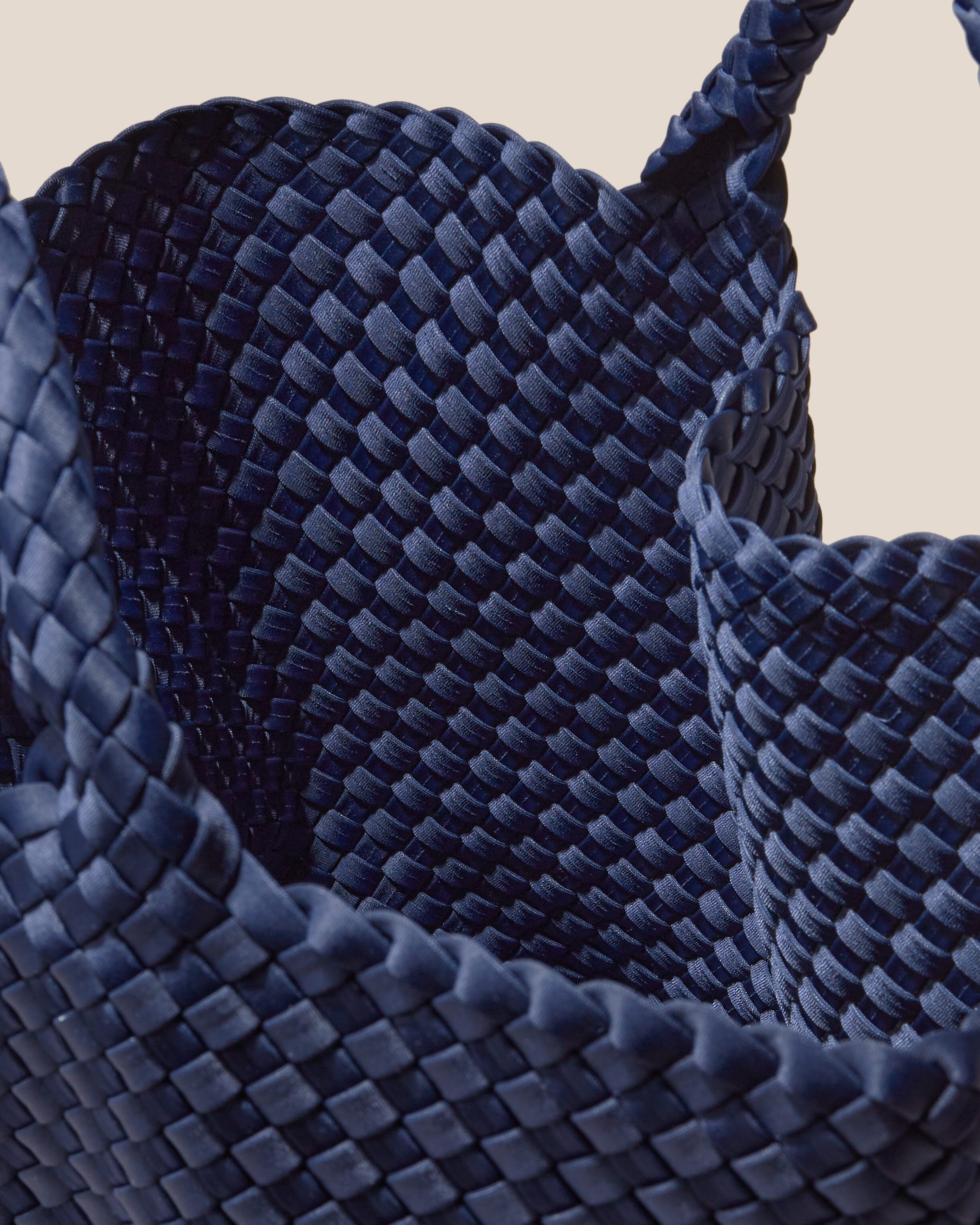 Interior close-up of St. Barths Tote in Ink Blue showing its open top, and unlined interior.