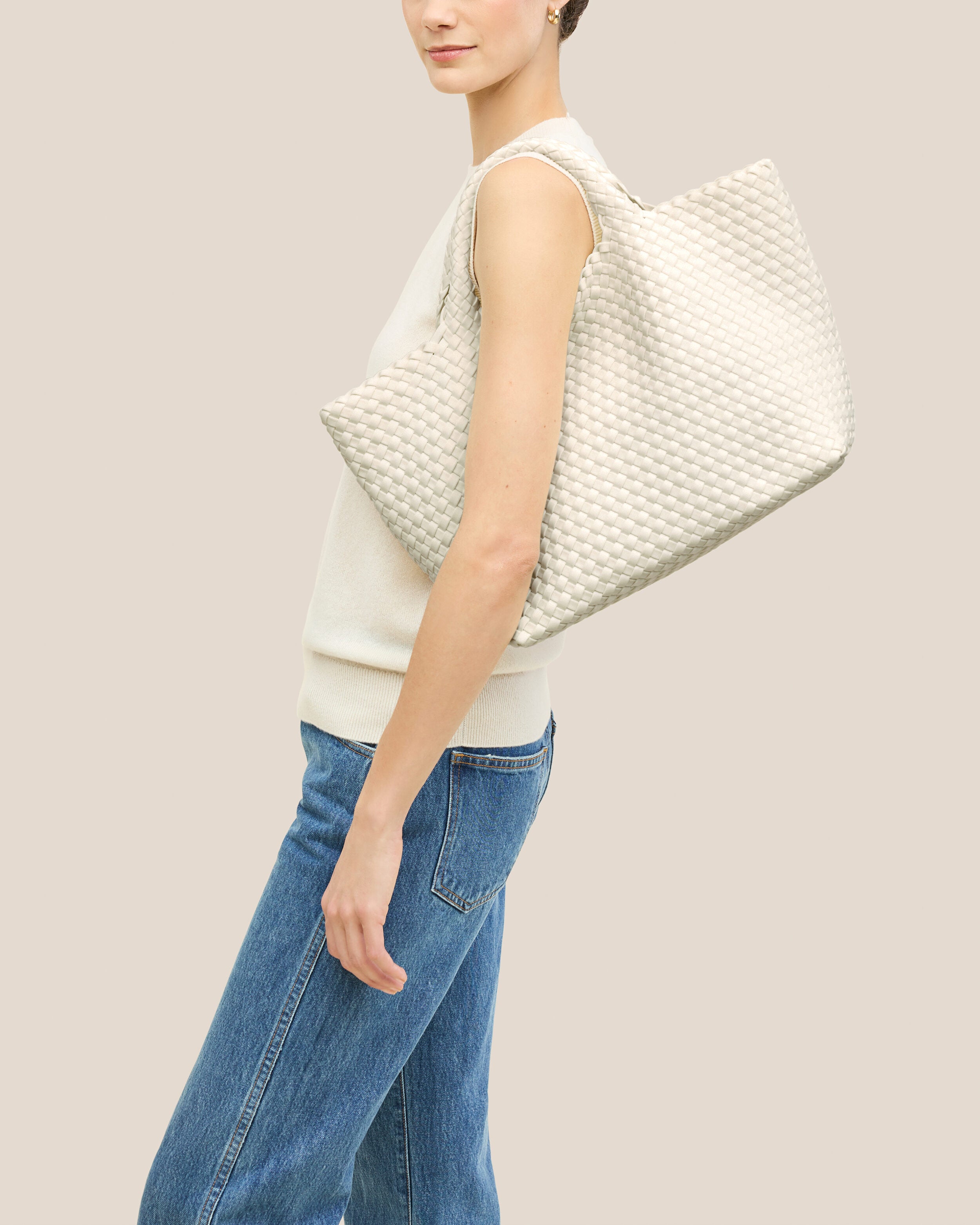 St. Barths Tote in Jasmine shown on model to illustrate scale and soft silhouette.