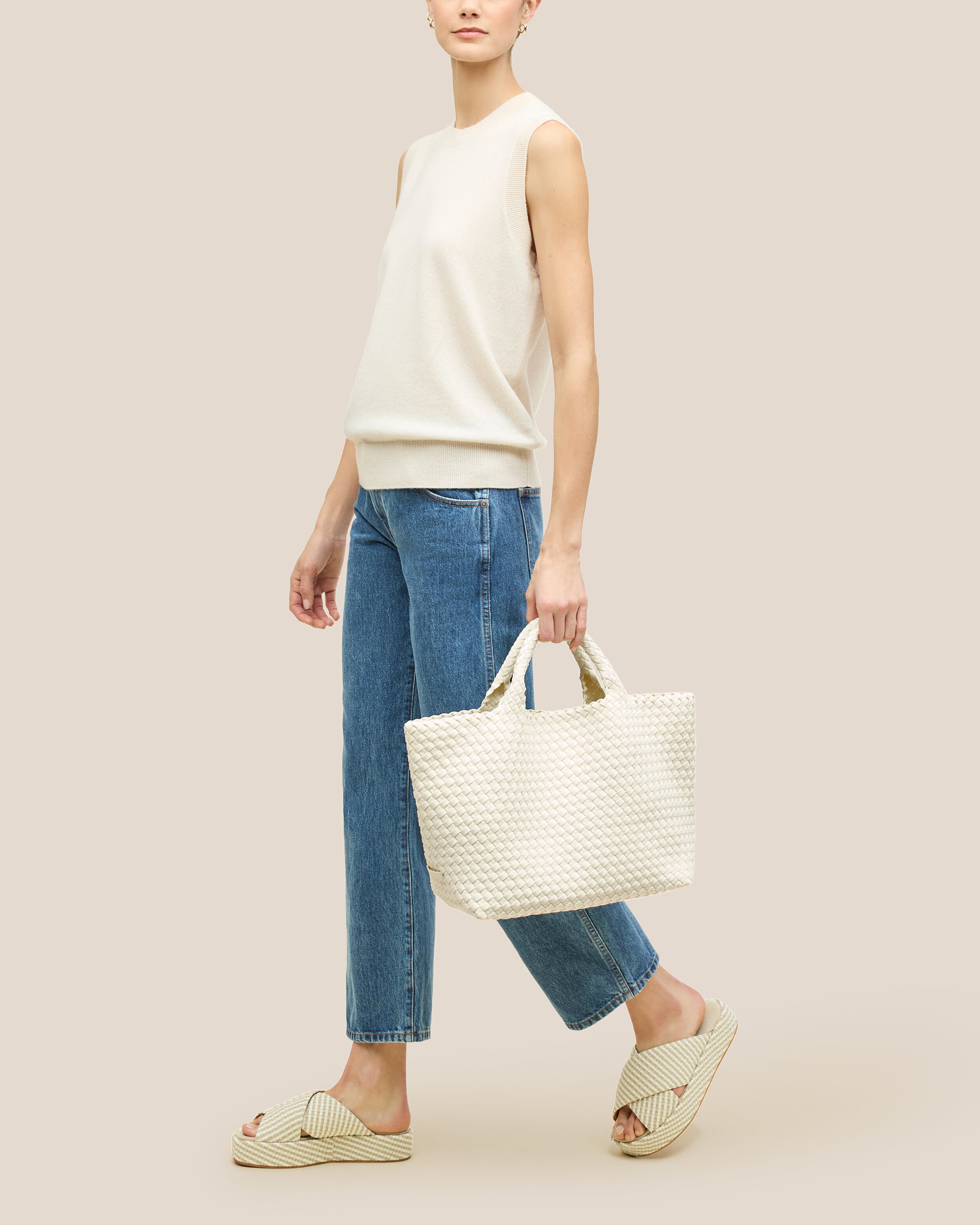 St. Barths Tote in Jasmine shown on model to illustrate scale and soft silhouette.