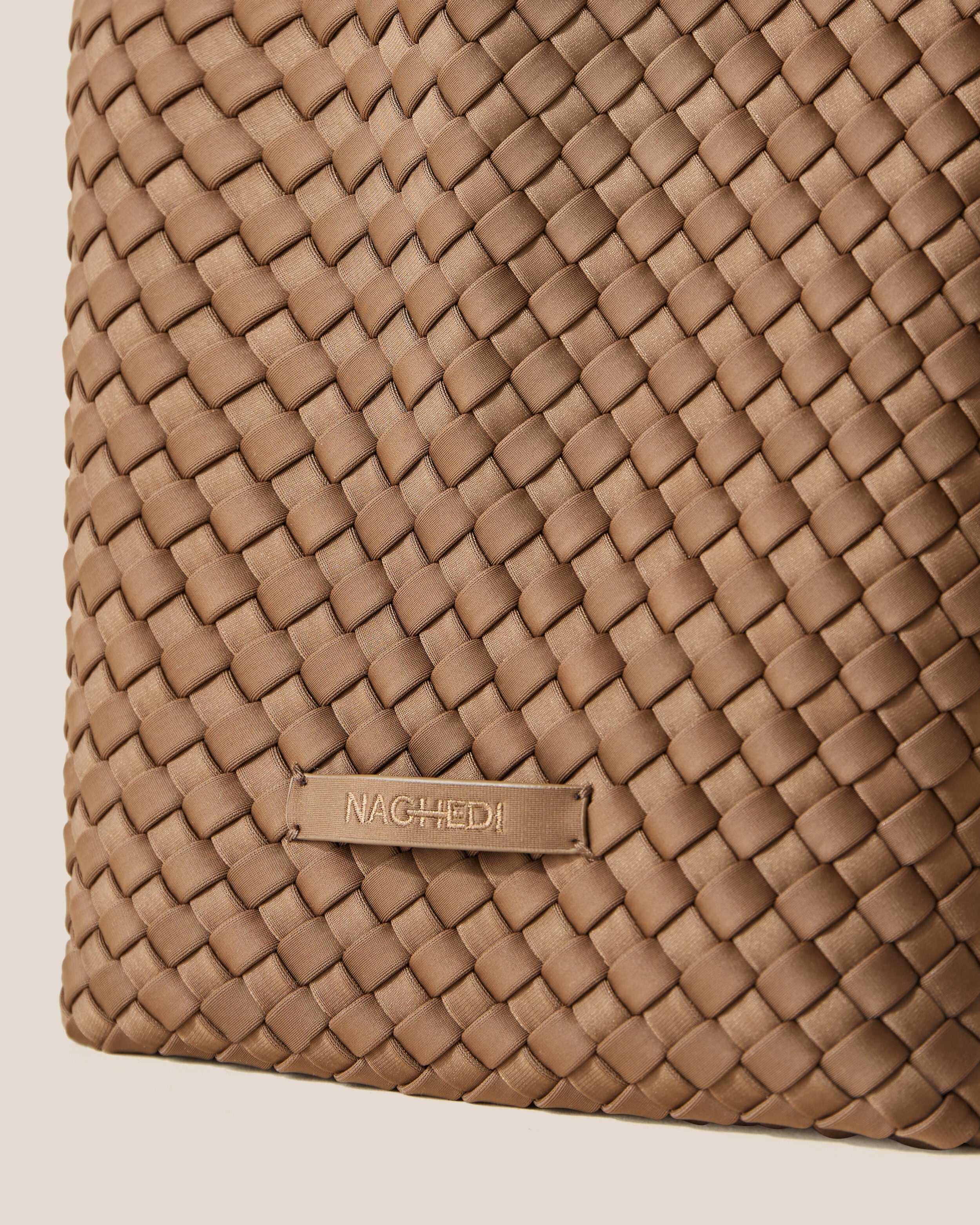 Close-up of stamped NAGHEDI logo on St. Barths Tote in Mink.
