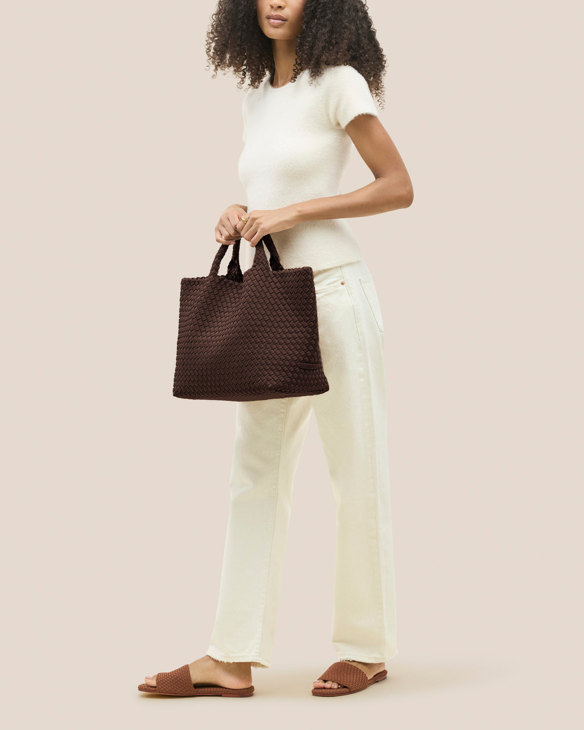 St. Barths Tote in Mocha shown on model to illustrate scale and soft silhouette.