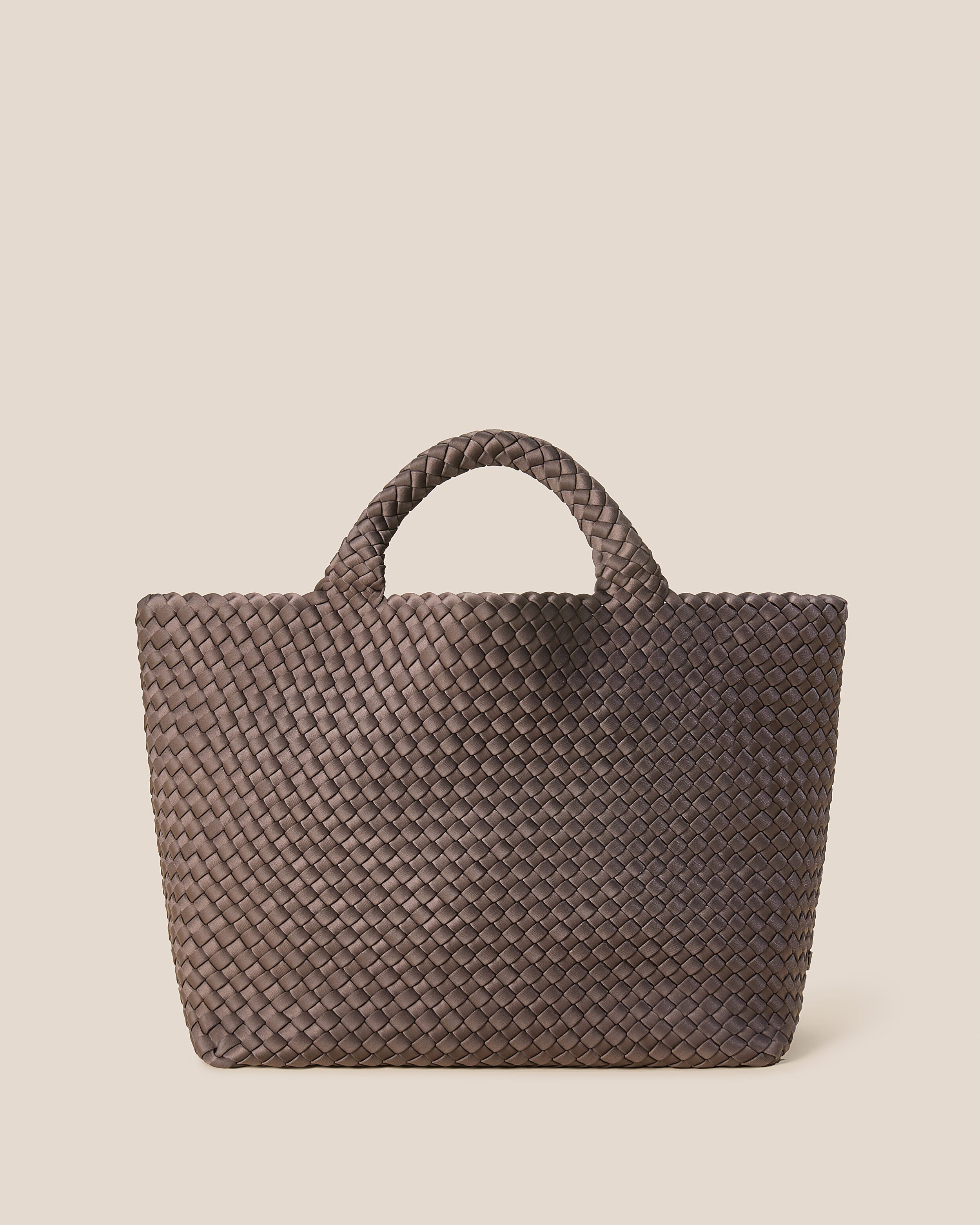 St. Barths Tote in Napa, a dark brown tone, in handwoven neoprene, featuring an open top, and woven top handles.
