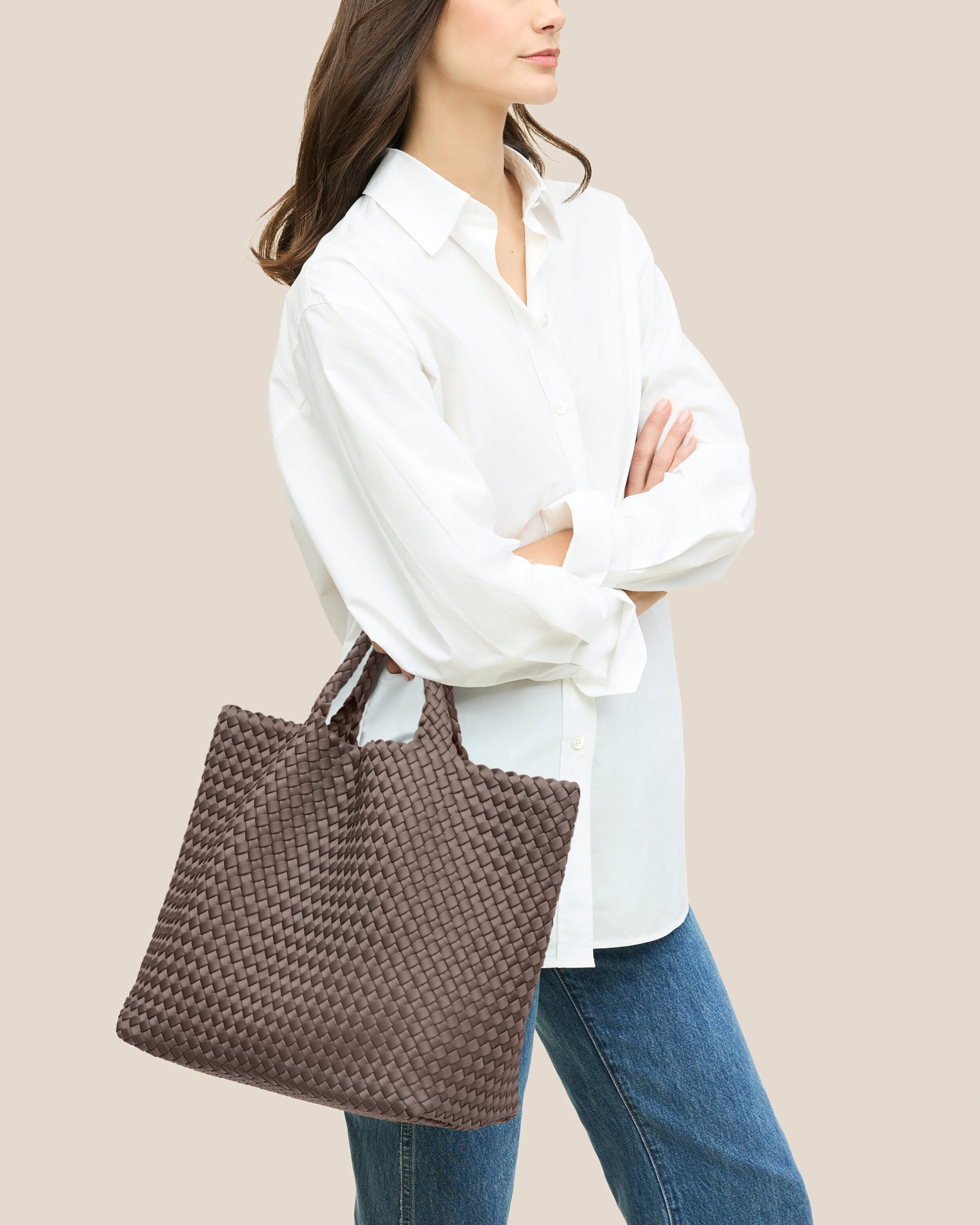 St. Barths Tote in Napa shown on model to illustrate scale and soft silhouette.