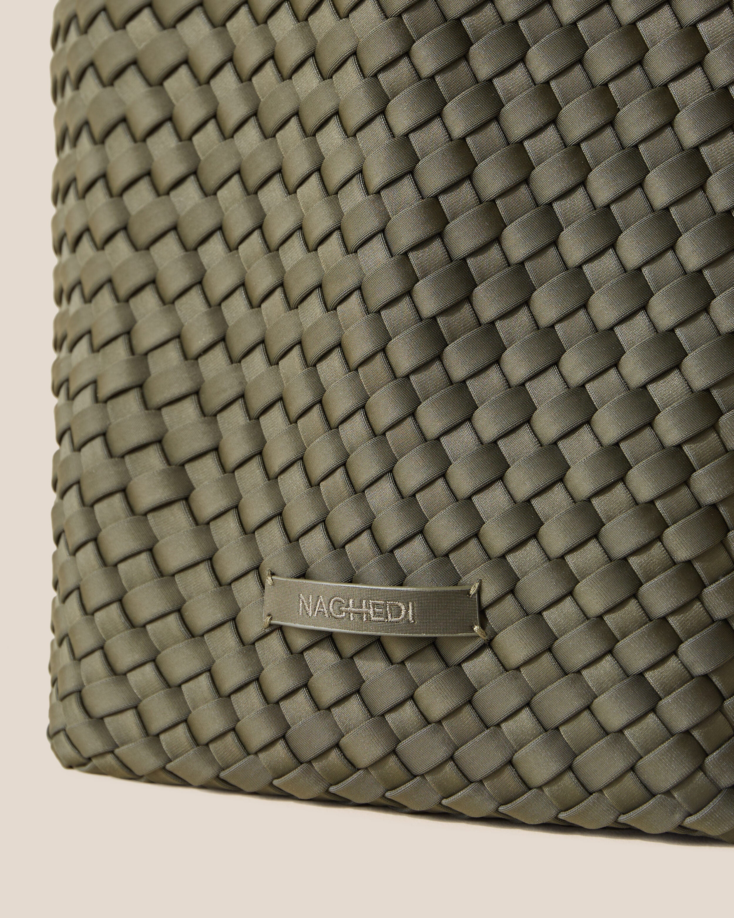 Close-up of stamped NAGHEDI logo on St. Barths Tote in Olive.