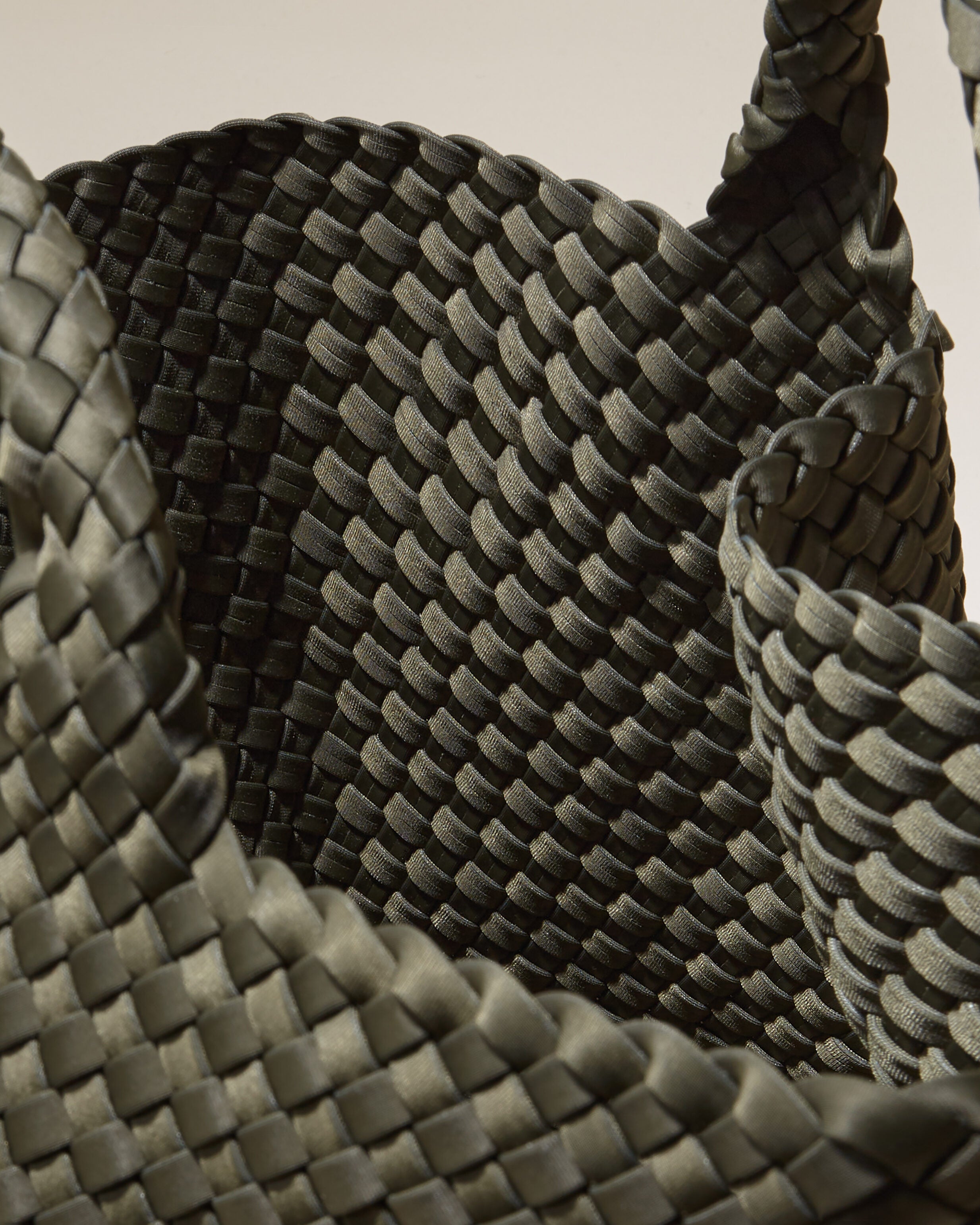 Interior close-up of St. Barths Tote in Olive showing its open top, and unlined interior.