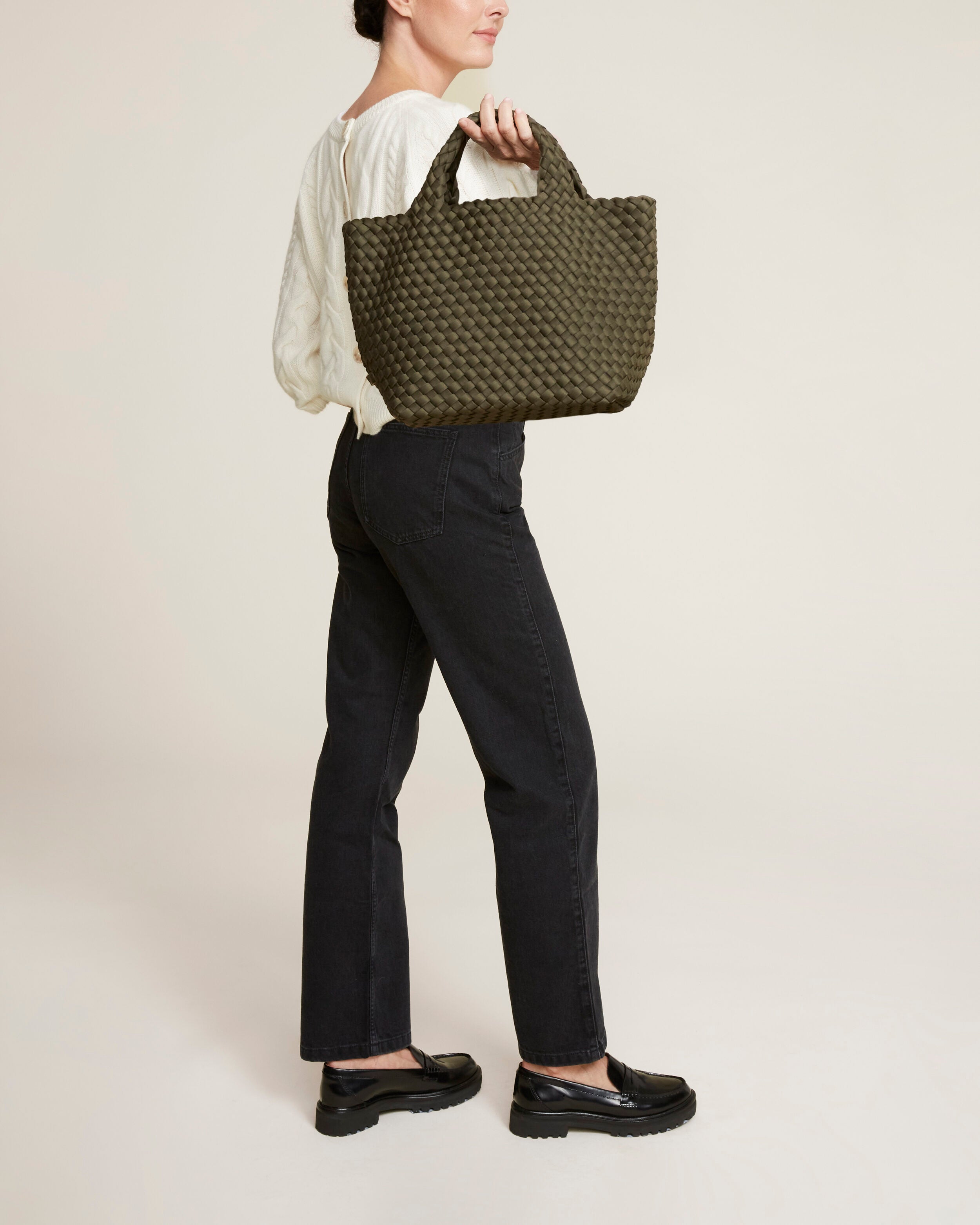 St. Barths Tote in Olive shown on model to illustrate scale and soft silhouette.